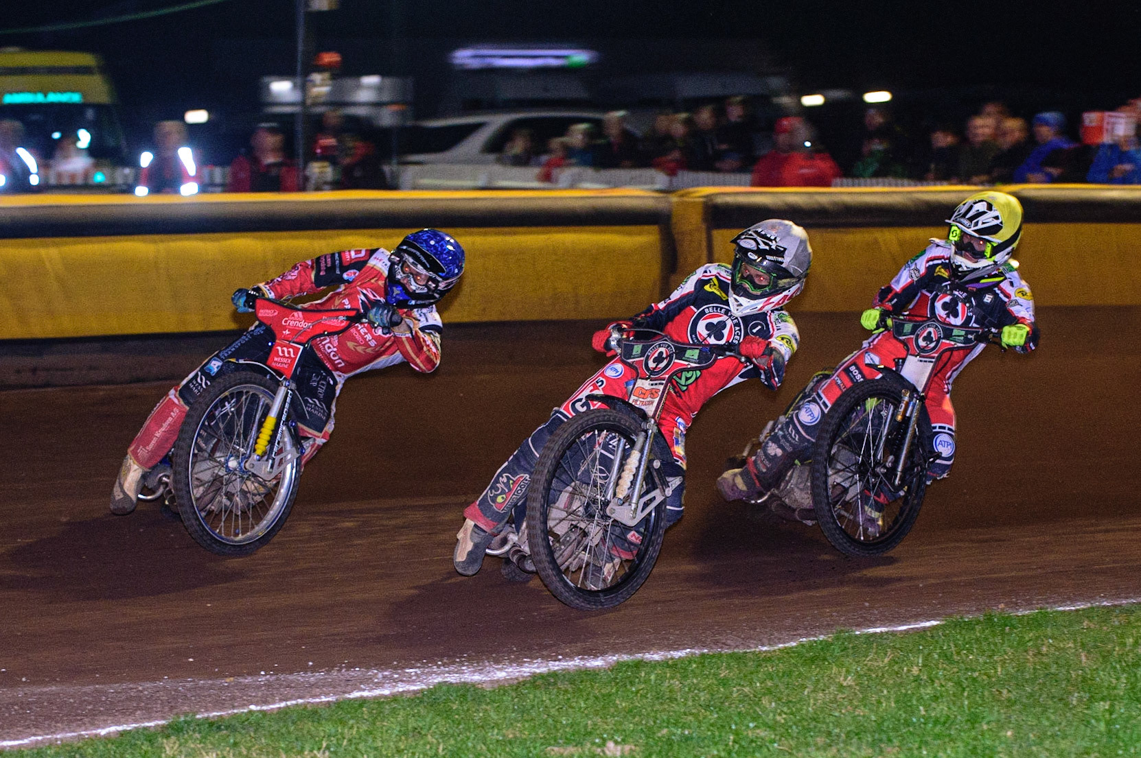 PETERBOROUGH, UK. OCT 14TH Dan Bewley  (White) inside Bjarne Pedersen  (Blue) with Tom Brennan  (Yellow) behind during the SGB Premiership Grand Final 2nd leg between Peterborough and Belle Vue Aces at East of England Showground, Peterborough on Thursday 14th October 2021. (Credit: Ian Charles | MI News)