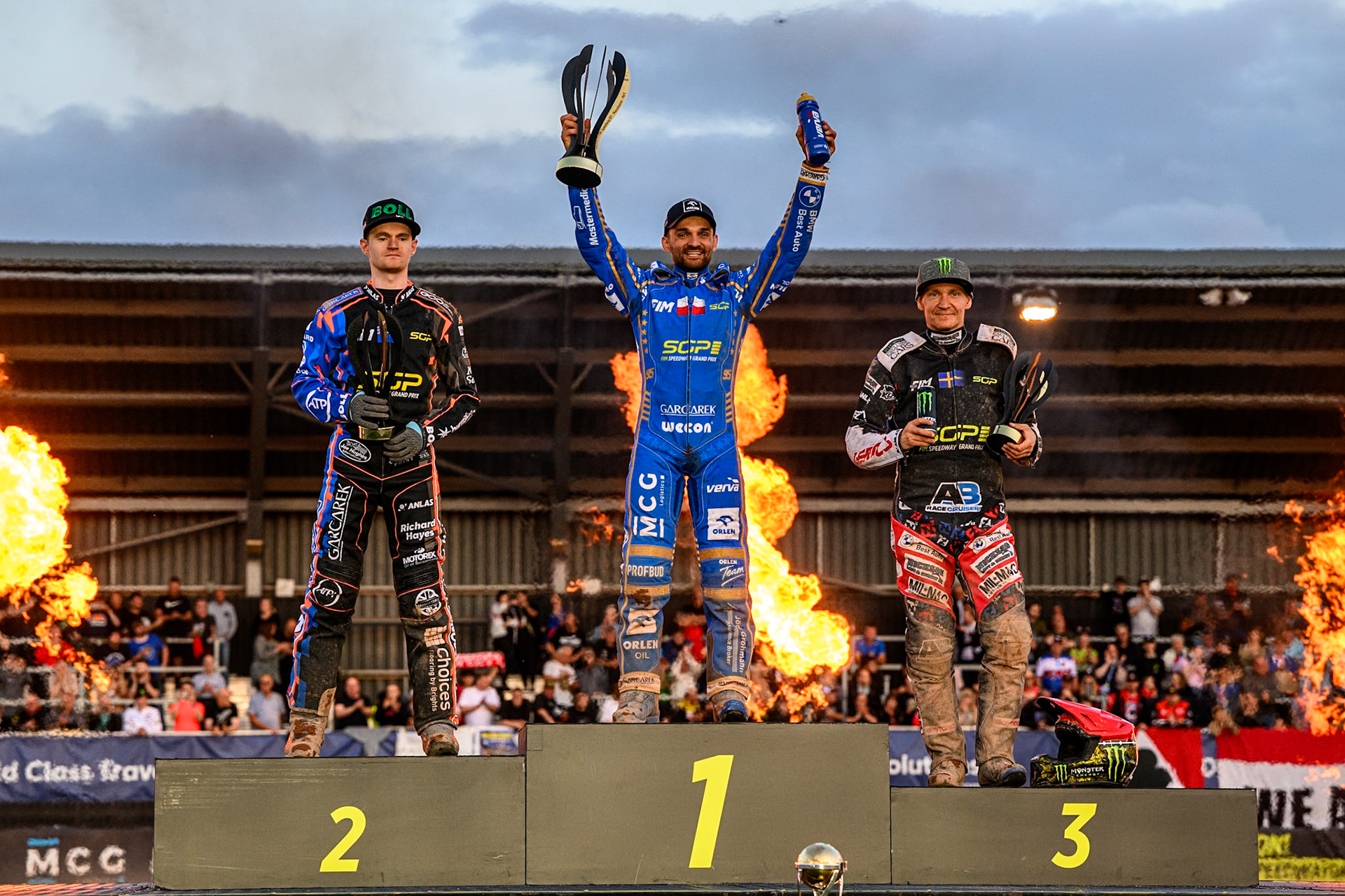 Top3: (L to R) Brady Kurtz (2nd), Bartosz Zmarzlik (First), Fredrik Lindgren (3rd) during the ATPI FIM Speedway Grand Prix Round 5 at the National Speedway Stadium, Manchester, on Saturday 14th June 2025. (Photo: Ian Charles | MI News)