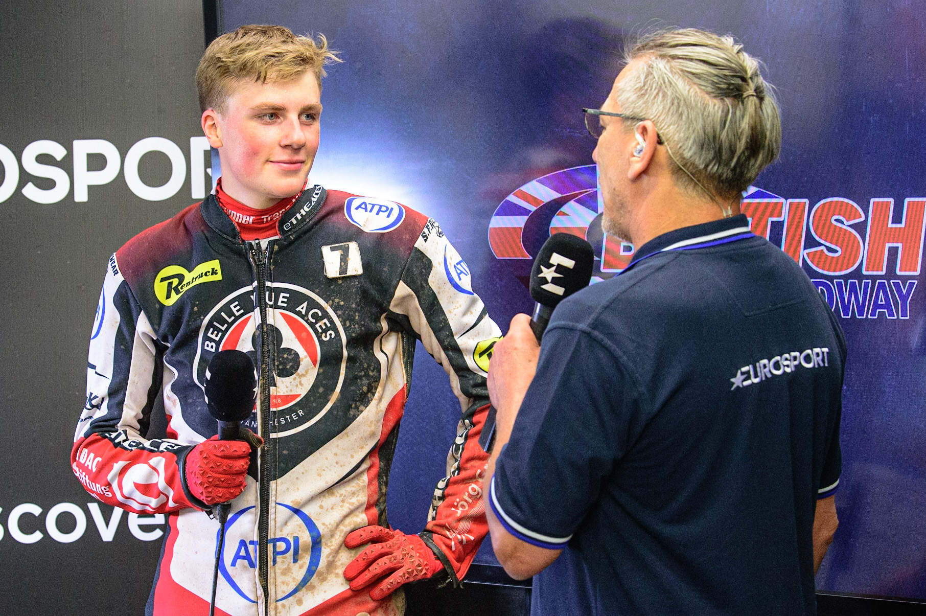 MANCHESTER UK  Norick Blodorn  (left) is interviewed by  Eurosport presenter Sam Ermolenko during the SGB Premiership match between Belle Vue Aces and King's Lynn Stars at the National Speedway Stadium, Manchester on Monday 11th July 2022. (Credit: Ian Charles | MI News)