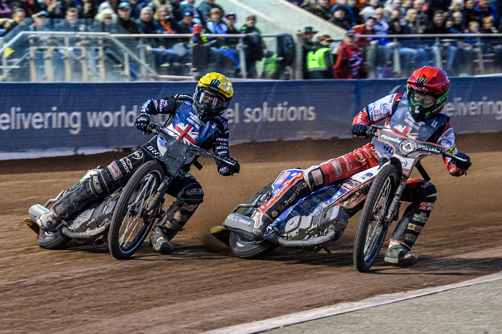 Dan Bewley in Red rides inside Tai Woffinden in Yellow in the final during the Attis Insurance Sports Division British Speedway Championship Final at the National Speedway Stadium, Manchester on Saturday 8th June 2024. (Photo: Ian Charles | MI News)