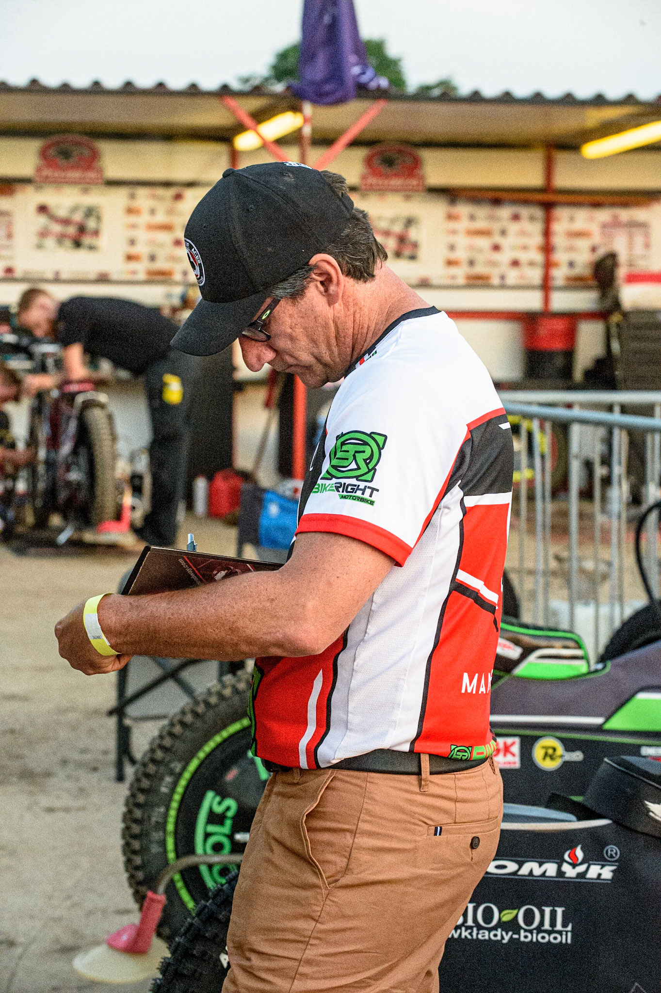 PETERBOROUGH, UK. JULY 19TH  Belle Vue BikeRight Aces  Manager Mark Lemon plans his next move during the SGB Premiership match between Peterborough and Belle Vue Aces at East of England Showground, Peterborough on Monday 19th July 2021. (Credit: Ian Charles | MI News)
