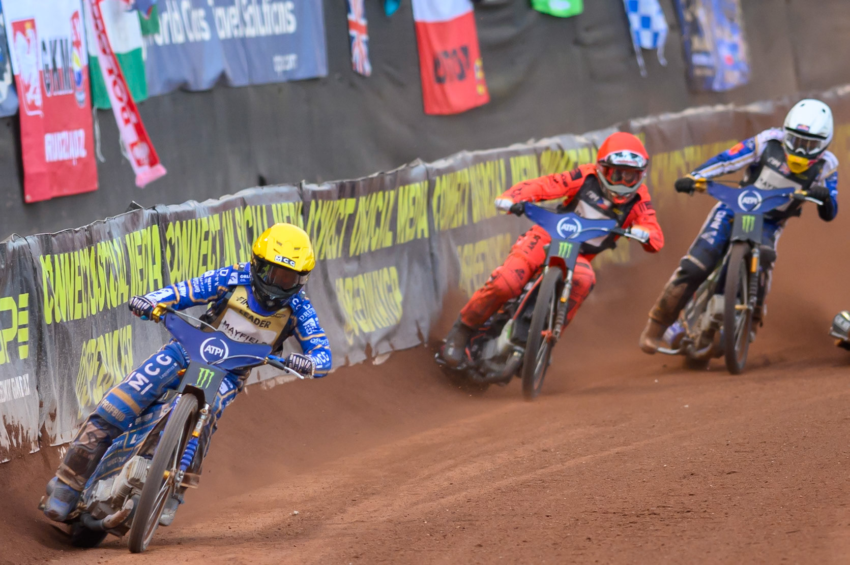 Bartosz Zmarzlik (95) of Poland in Yellow leading Jan Kvech (201) of Czech Republic in Red and Robert Lambert (505) of Great Britain in White during the ATPI  FIM Speedway GP of Manchester at the National Speedway Stadium, Manchester on Friday 5th June 2026. (Photo: Ian Charles | MI News)