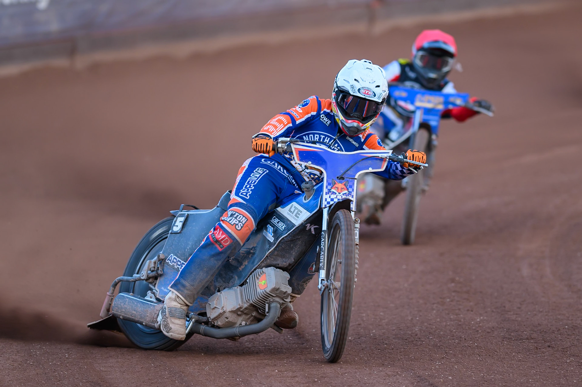 Nicolai Klindt of Northampton Foxes in White leading Ben Cook, Guest Rider for Belle Vue Aces in Red during the Rowe Motor Oil Premiership match between Belle Vue Aces and Northampton Foxes at the National Speedway Stadium, Manchester on Monday 13th July 2026. (Photo: Ian Charles | MI News)
