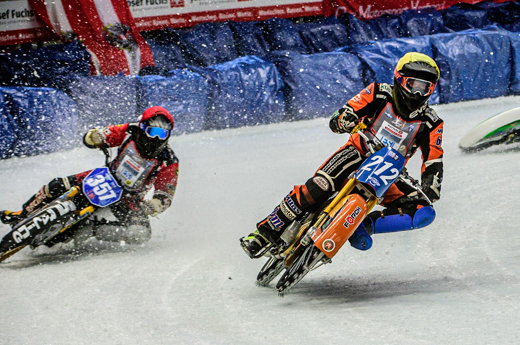 Lukas Hutla (212) (Yellow) picks up ahead of Jo Saetre (357)(Red) during the Ice Speedway Gladiators World Championship Final 1 at Max-Aicher-Arena, Inzell, Germany on Saturday 18th March 2023. (Photo: Ian Charles | MI News)
