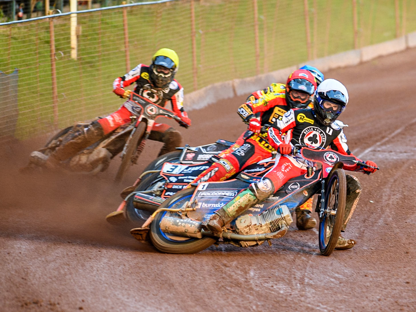 Belle Vue Aces' Brady Kurtz in White leading Leicester Lions' Sam Masters in Red, Leicester Lions' Luke Becker in Blue and Belle Vue Aces' Norick Blodorn in Yellow during the Rowe Motor Oil Premiership match between Leicester Lions and Belle Vue Aces at the Pidcock Motorcycles Arena, Leicester on Thursday 25th July 2024. (Photo: Ian Charles | MI News)