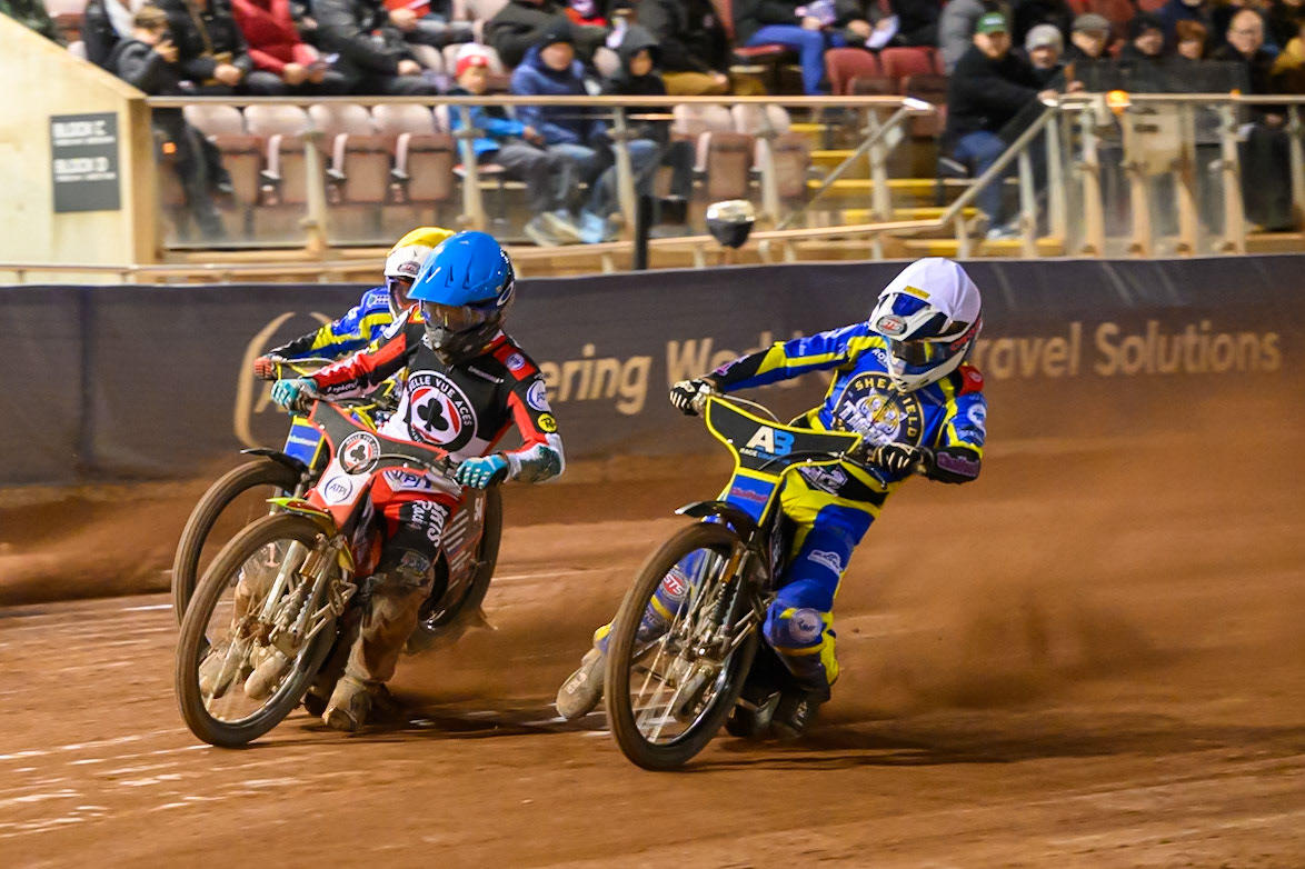 Tate Zischke of Belle Vue Aces    in Blue rides outside Leon Flint of Sheffield Tigers    in White with Luke Killeen of Sheffield Tigers   in Yellow behind during the Knockout Cup, Northern Section match between Belle Vue Aces and Sheffield Tigers at the National Speedway Stadium, Manchester on Monday 30th March 2026. (Photo: Ian Charles | MI News)