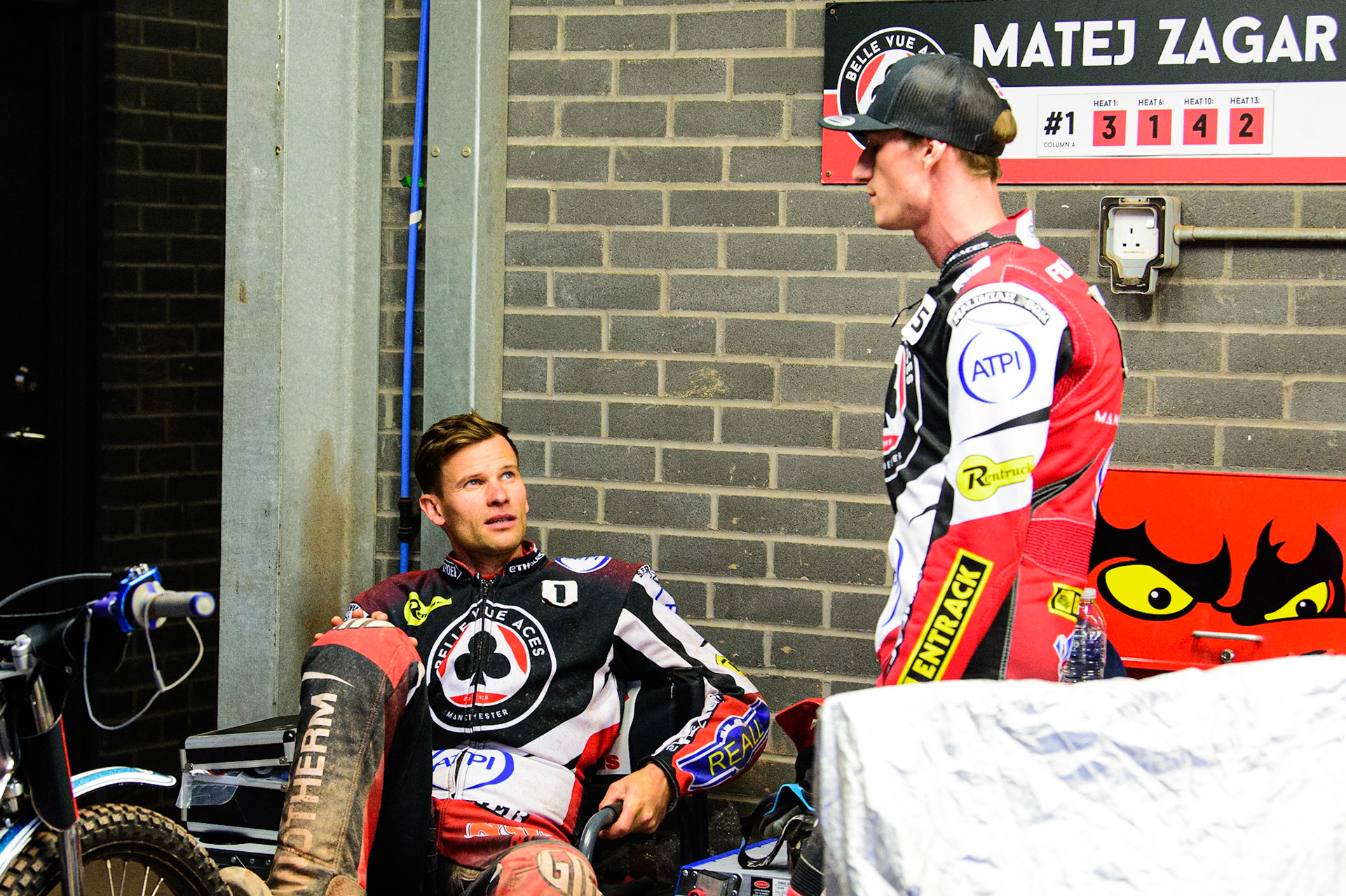 Matej Zagar (left) chats with team mate Max Fricke during the SGB Premiership match between Belle Vue Aces and Peterborough at the National Speedway Stadium, Manchester on Monday 25th July 2022. (Credit: Ian Charles | MI News