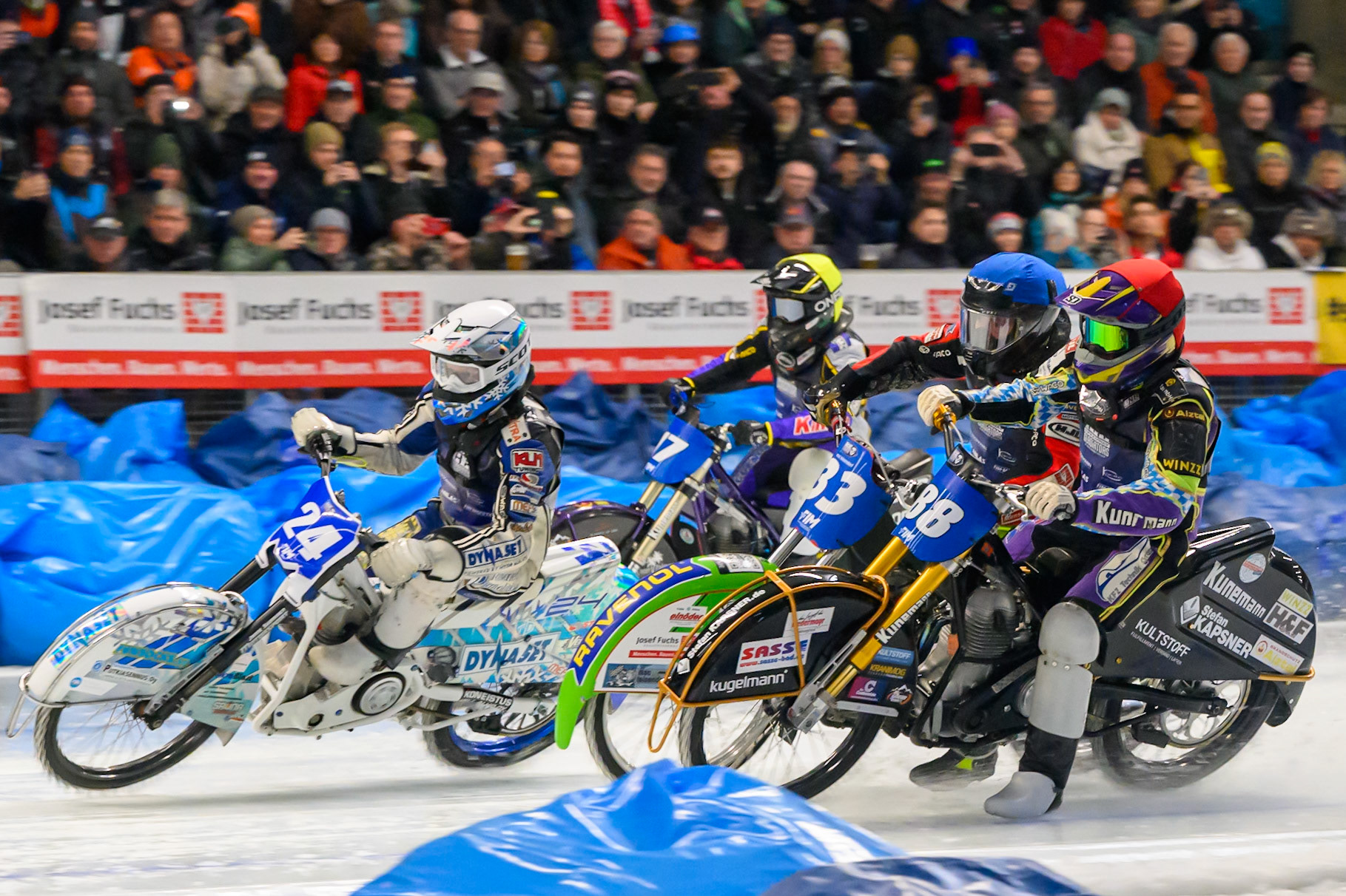 Max Koivula (24) of Finland in White leading Johann Weber (33) of Germany iin Blue, Max Niedermaier (88) of Germany  in Red and Reserve Christoph Kirchner of Germany  in Yellow in the re-run of Heat 1 during the Ice Speedway Gladiators World Championship Final 2 at Max-Aicher-Arena, Inzell on Sunday 15th March 2026. (Photo: Ian Charles | MI News)