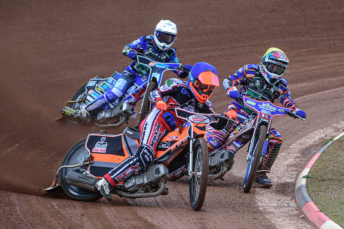 MANCHESTER, UK. APR 15TH   Connor Coles  (Blue) leads Henry Atkins  (Yellow) and Jody Scott (White) during the National Development League match between Belle Vue Colts and Plymouth Centurions at the National Speedway Stadium, Manchester on Friday 15th April 2022. (Credit: Ian Charles | MI News)