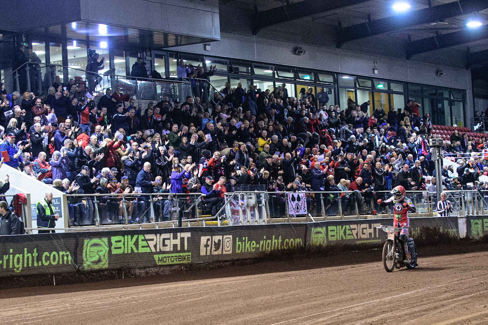 MANCHESTER, UK. OCT 7TH  Dan Bewley  acknowledges the fans with Aces poised to win the meeting during the SGB Premiership Play off Semi-Final Second Leg between Belle Vue Aces and Sheffield Tigers at the National Speedway Stadium, Manchester on Thursday 7th October 2021. (Credit: Ian Charles | MI News)