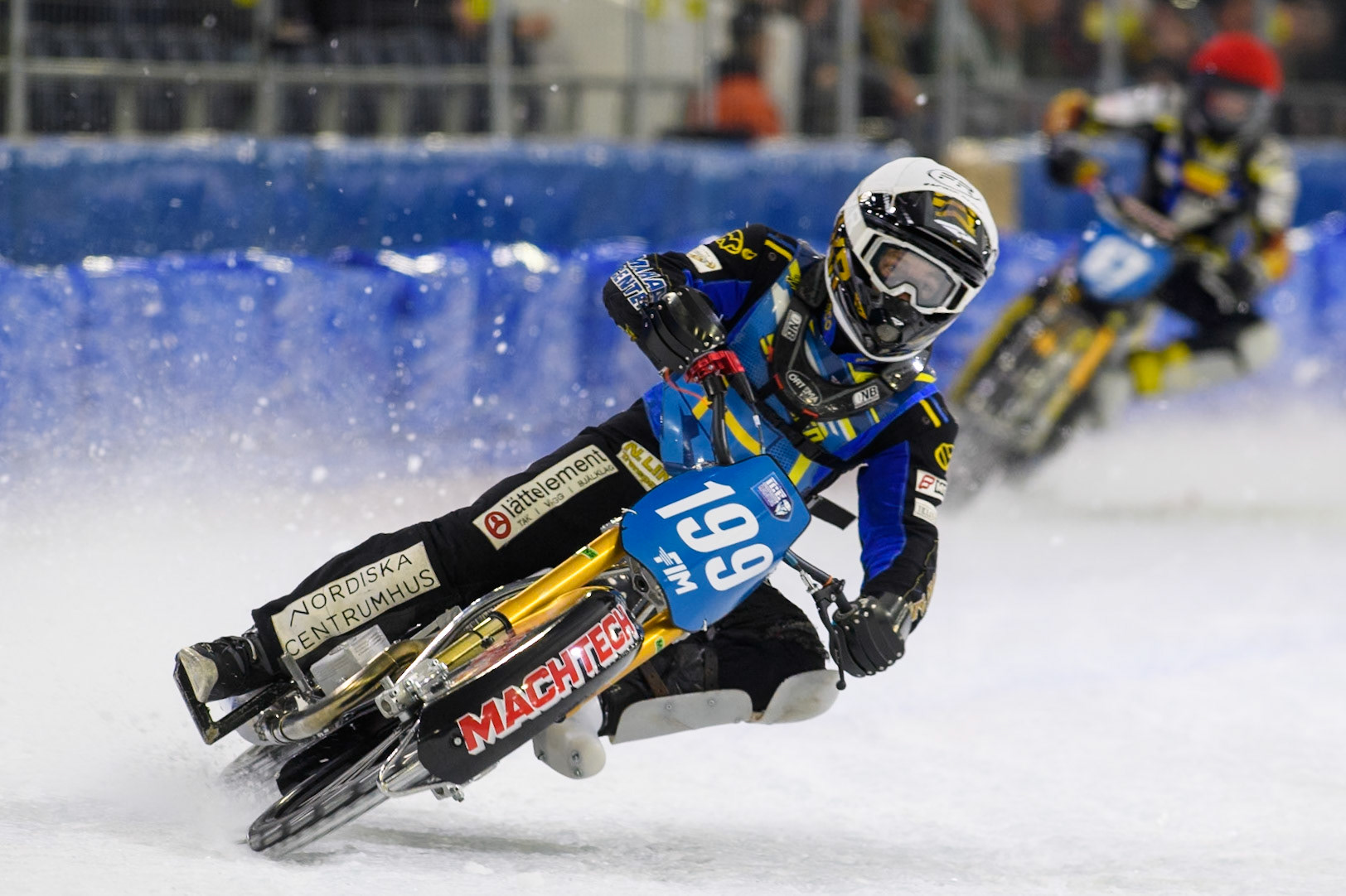 Martin Haarahiltunen (199) of Sweden in White leading Heikki Huusko (67) of Finland in Red during the FIM Ice Speedway Gladiators World Championship, Final 3 at the Ice Stadium, Thialf, Heerenveen on Saturday 5th April 2025. (Photo: Ian Charles | MI News)