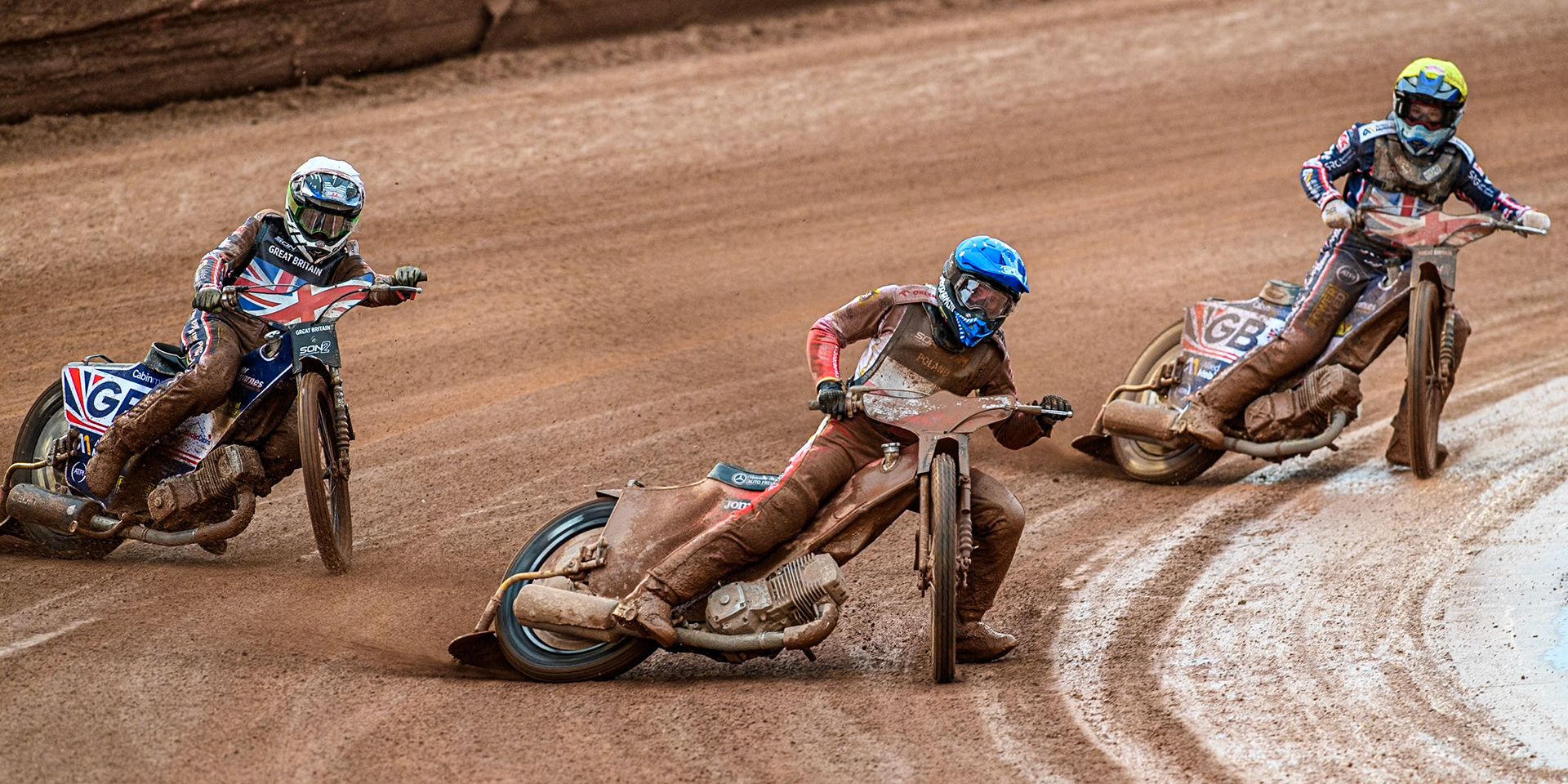 Wiktor Przyjemski of Poland in Blue leading Leon Flint of Great Britain in White and Sam Hagon of Great Britain in Yellow during the Monster Energy FIM Speedway of Nations 2 (Under 21) Final at the National Speedway Stadium, Manchester on Friday 12th July 2024. (Photo: Ian Charles | MI News)