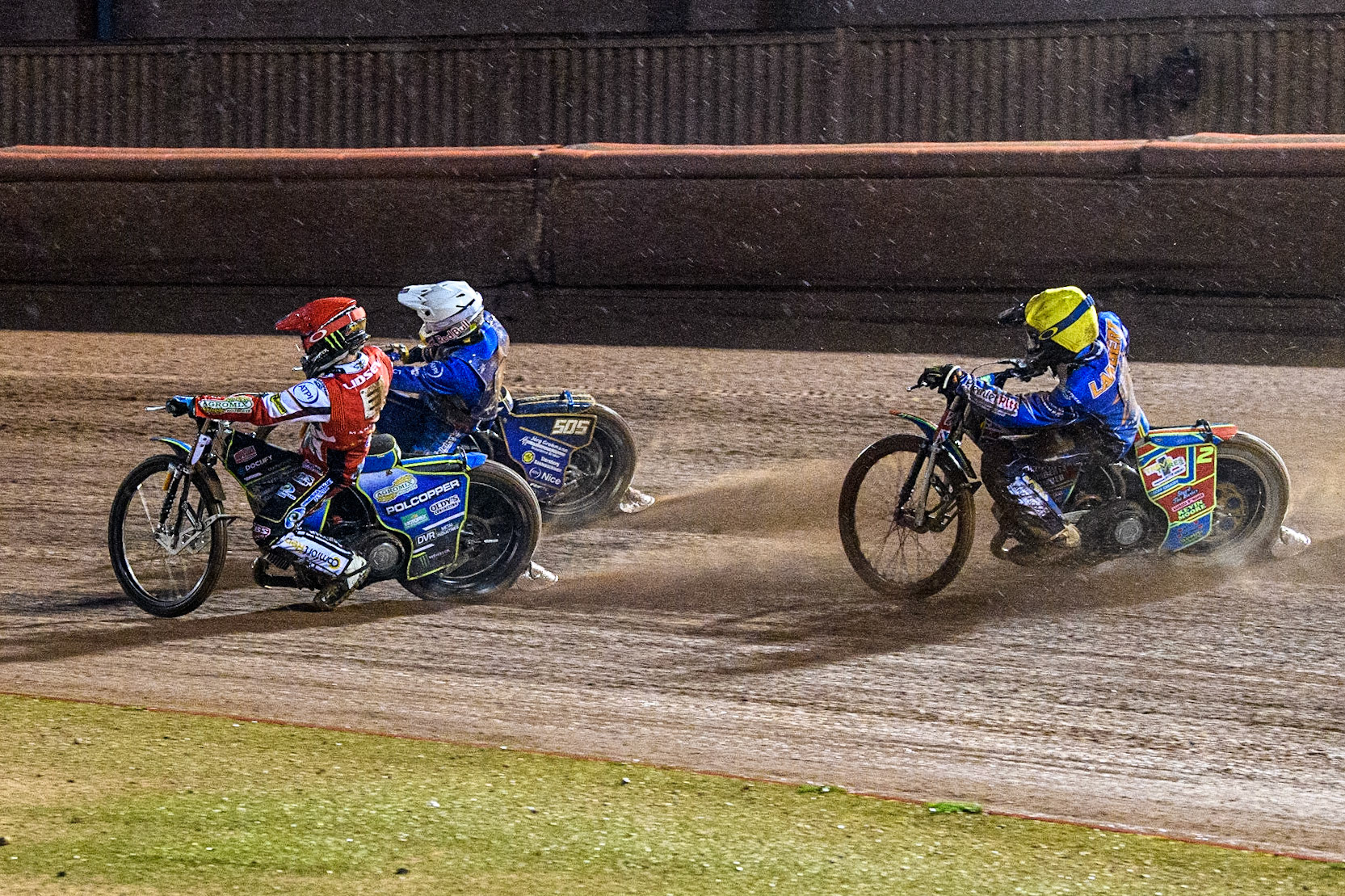 Jaimon Lidsey (Red) inside Robert Lambert (White) with Simon Lambert behind during the Sports Insure Premiership match between Belle Vue Aces and King's Lynn Stars at the National Speedway Stadium, Manchester on Monday 21st August 2023. (Photo: Ian Charles | MI News)