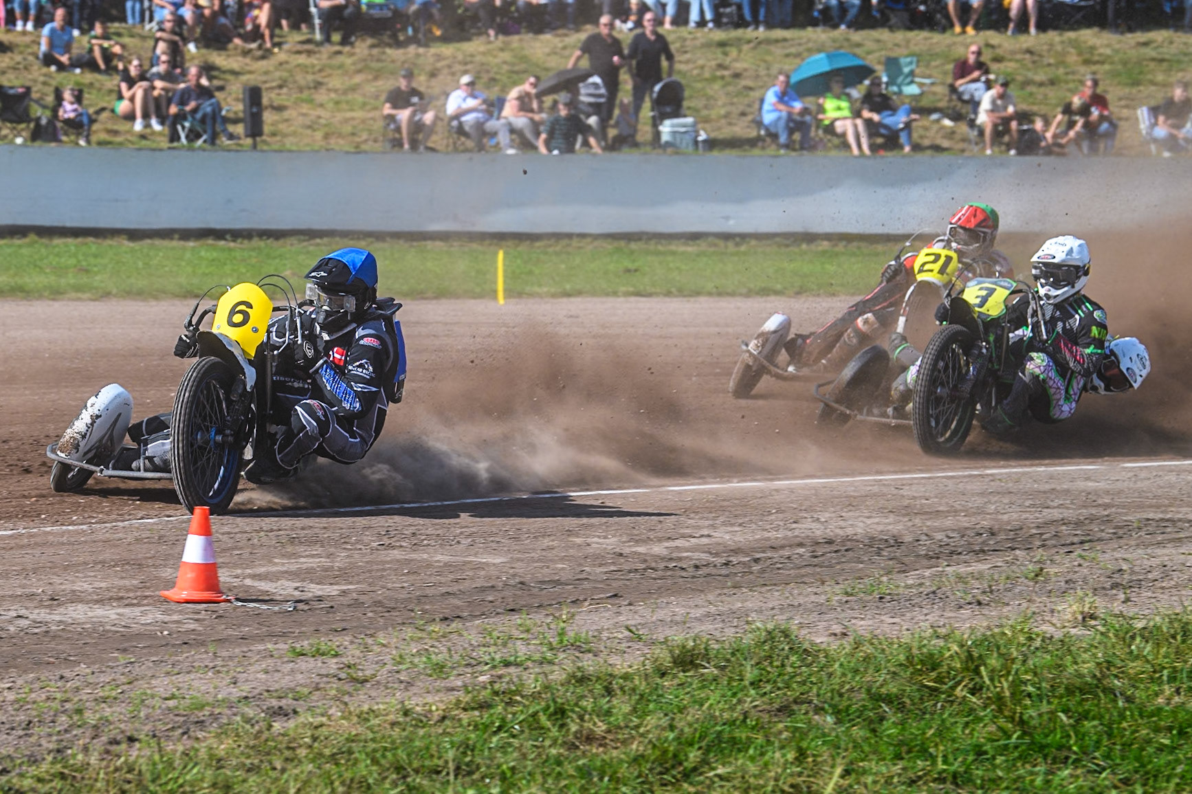 Mike Frederiksen &amp; Jette Maersk (6) of Denmark lin Blue leading Josh &amp; Scott Goodwin (3) of Great Britain  in White and Jérémy Malpeyre &amp; Dylan Bouillard (21) of France in Red during the FIM Long Track World Championship Final 5 at the Speed Centre Roden, Roden, Netherlands on Sunday 22nd September 2024. (Photo: Ian Charles | MI News)