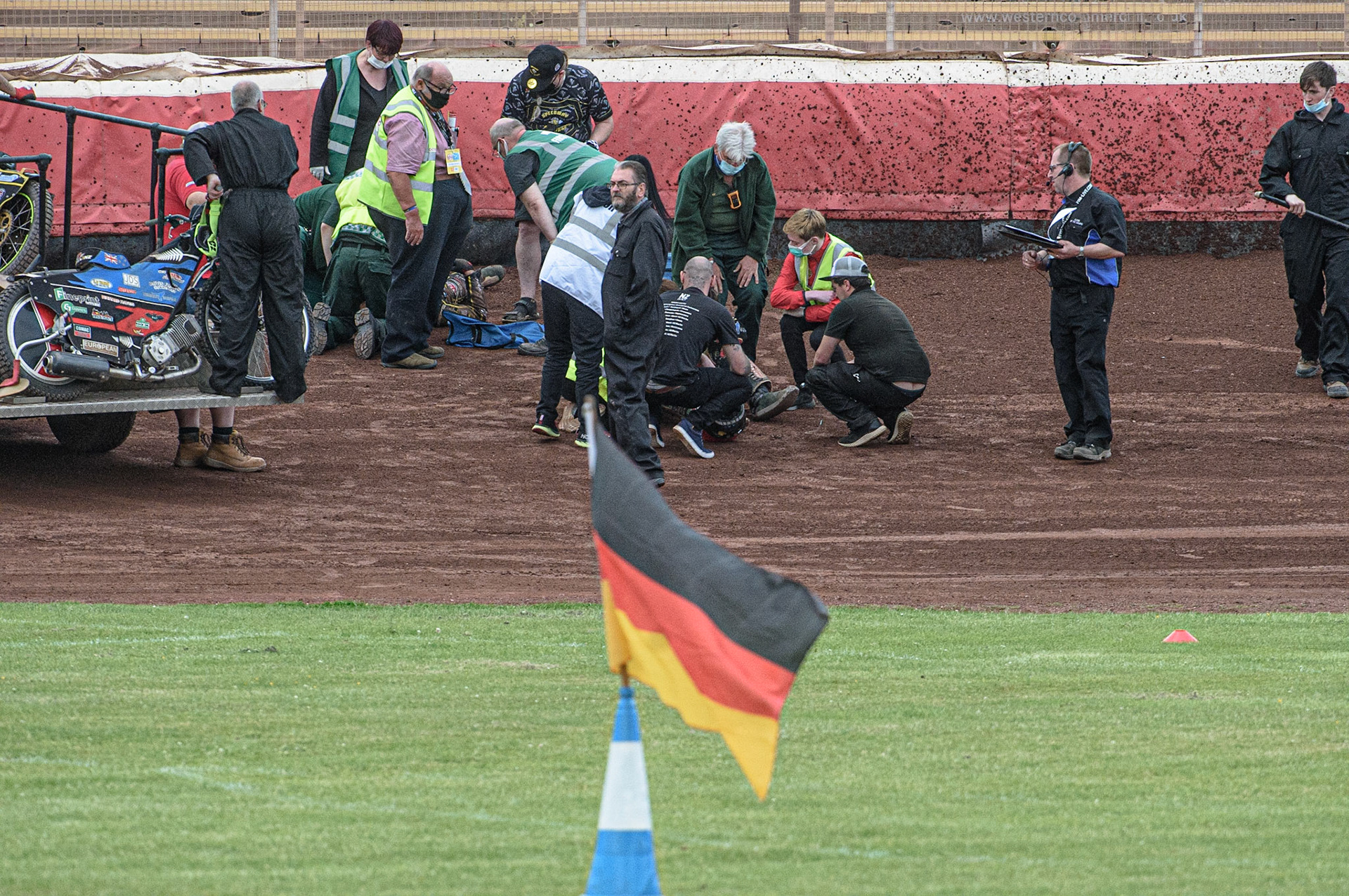 GLASGOW, UK. JUNE 19TH.  Medical staff attend to the fallen riders Bradley Dean-Wilson (New Zealand) and Tero Aarnio (Finland) during the FIM Speedway Grand Prix Qualifying Round at the Peugeot Ashfield Stadium, Glasgow on Saturday 19th June 2021. (Credit: Ian Charles | MI News)