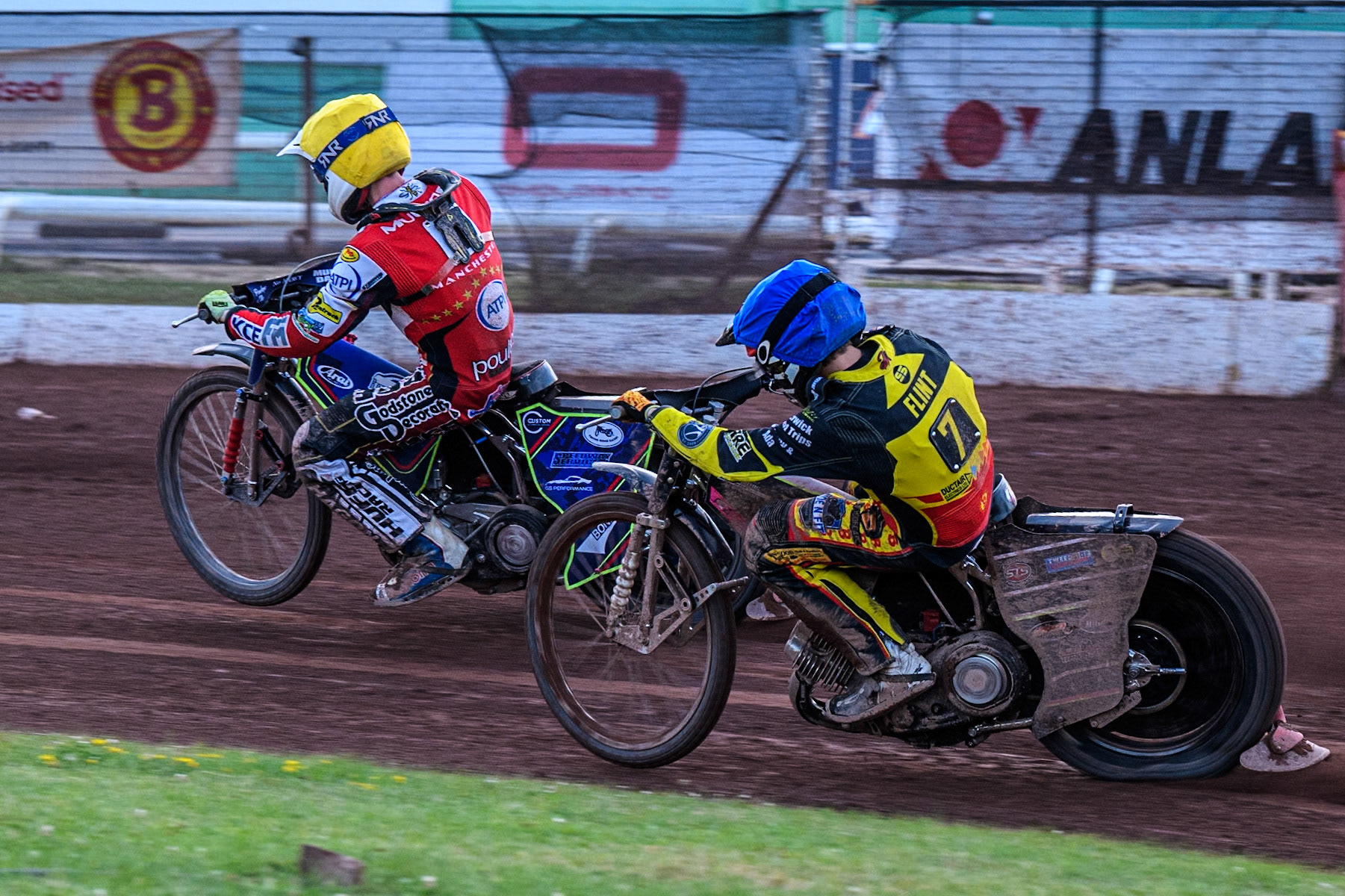 Birmingham Brummies' Leon Flint in Blue chases Belle Vue Aces' Jake Mulford in Yellow during the Rowe Motor Oil Premiership match between Birmingham Brummies and Belle Vue Aces at Perry Bar Stadium, Birmingham on Monday 29th July 2024. (Photo: Ian Charles | MI News)