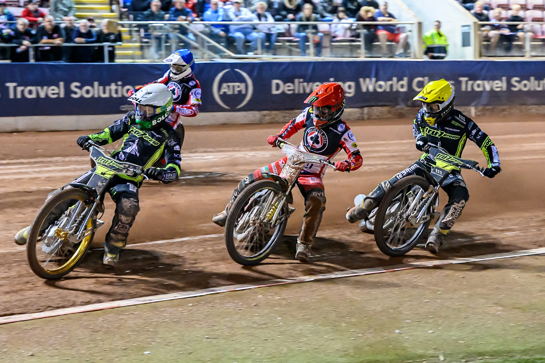 Jason Doyle of Ipswich Witches  in White leading Jaimon Lidsey of Belle Vue Aces  in Red Adam Ellis of Ipswich Witches  in Yellow and Jake Mulford of Belle Vue Aces  in Blue  during the Rowe Motor Oil Premiership Play Off Semi Final 1 (1st Leg)  between Belle Vue Aces and Ipswich Witches at the National Speedway Stadium, Manchester on Monday 8th September 2025. (Photo: Ian Charles | MI News)
