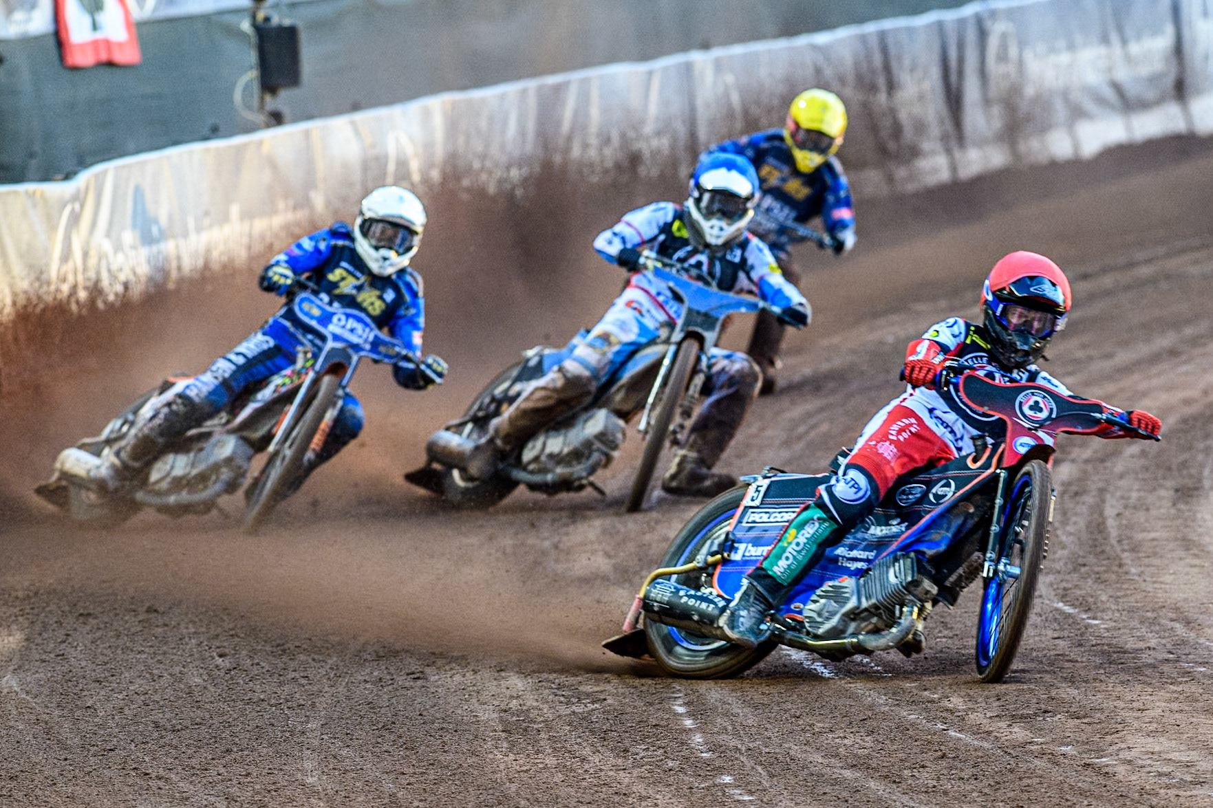 Belle Vue Aces' Brady Kurtz in Red leading Belle Vue Aces' Antti Vuolas in Blue, Kings Lynn Stars' Niels-Kristian Iversen  in White and Kings Lynn Stars' Patryk Wojdylo  in Yellow during the Rowe Motor Oil Premiership match between Belle Vue Aces and King's Lynn Stars at the National Speedway Stadium, Manchester on Monday 12th August 2024. (Photo: Ian Charles | MI News)