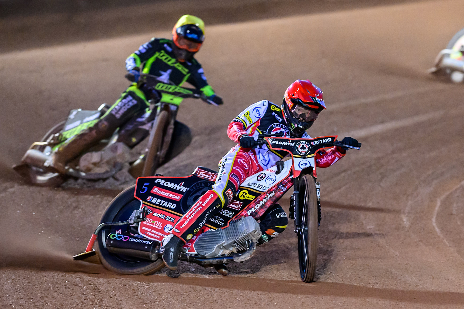 Dan Bewley of Belle Vue Aces in Red leading Jason Edwards of Ipswich Witches  in Yellow during the Rowe Motor Oil Premiership Play Off Semi Final 1 (1st Leg)  between Belle Vue Aces and Ipswich Witches at the National Speedway Stadium, Manchester on Monday 8th September 2025. (Photo: Ian Charles | MI News)