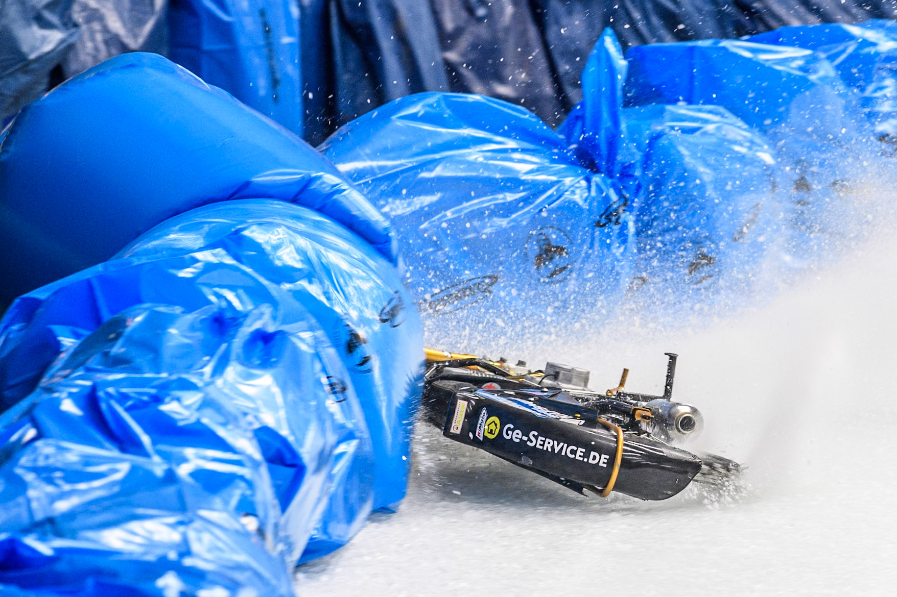 Max Niedermaier  (88) of Germany spins off and hits the bales during the Ice Speedway Gladiators World Championship Final 1 at Max-Aicher-Arena, Inzell on Saturday 15th March 2025. (Photo: Ian Charles | MI News)