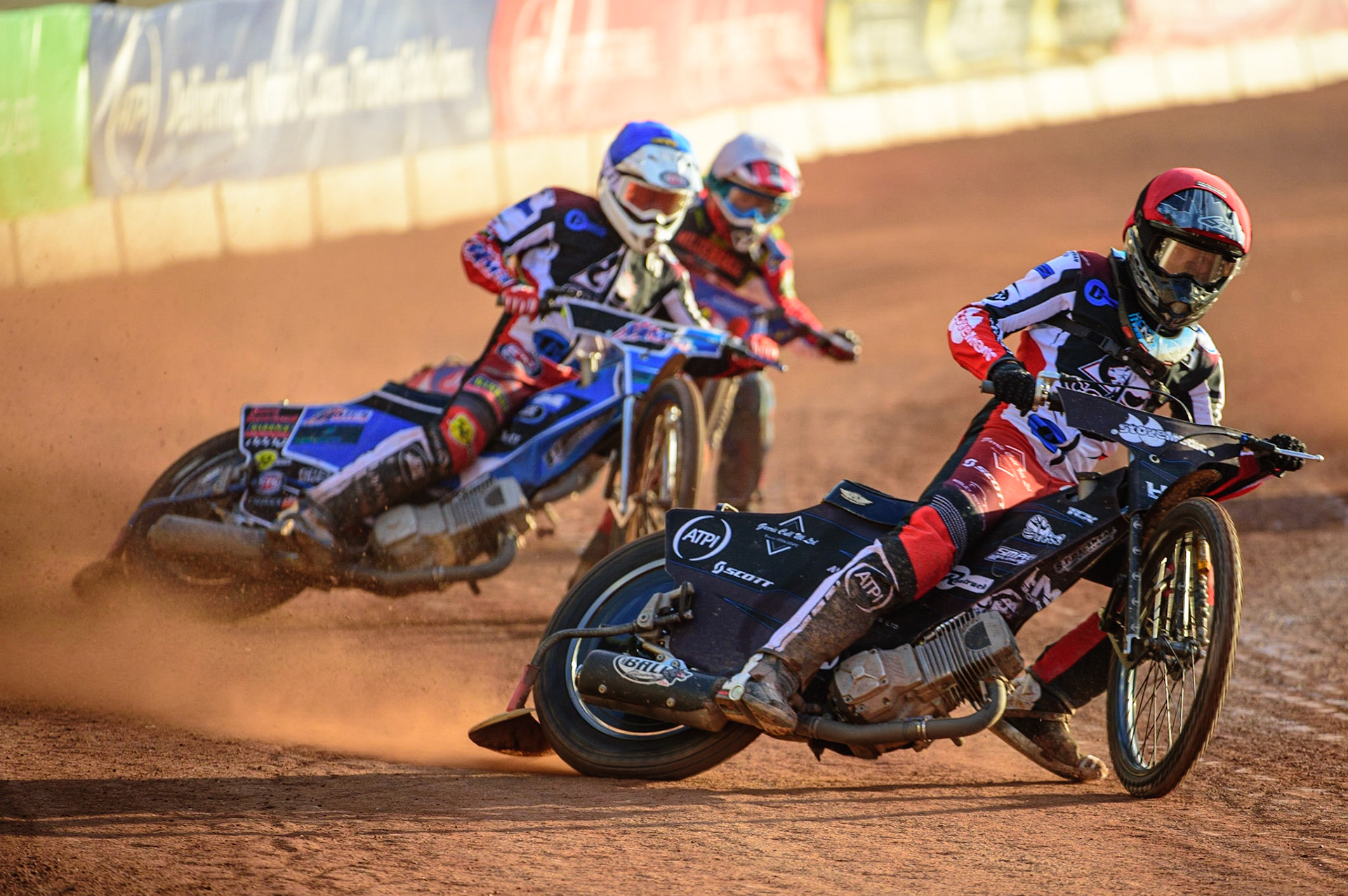Harry McGurk  (Red) leads Archie Freeman (Blue) and Jacob Fellows (White) during the National Development League match between Belle Vue Colts and Mildenhall Fens Tigers at the National Speedway Stadium, Manchester on Friday 15th July 2022. (Credit: Ian Charles | MI News)
