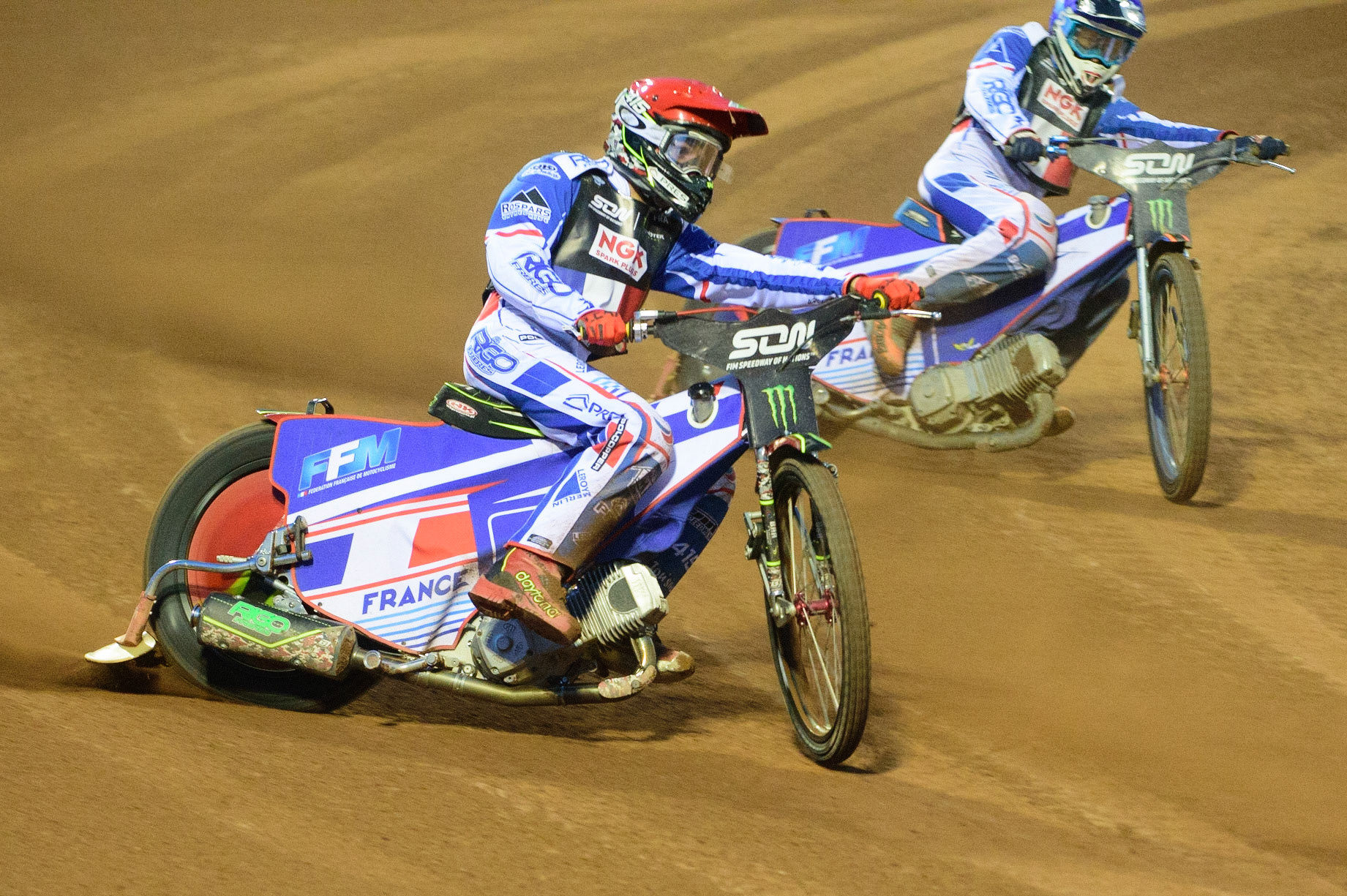 MANCHESTER, UK. OCT 16TH David Bellego of France (Red)  leads Dmitri Berge of France (Blue) during the Monster Energy FIM Speedway of Nations at the National Speedway Stadium, Manchester on Saturday  16th October 2021. (Credit: Ian Charles | MI News)
