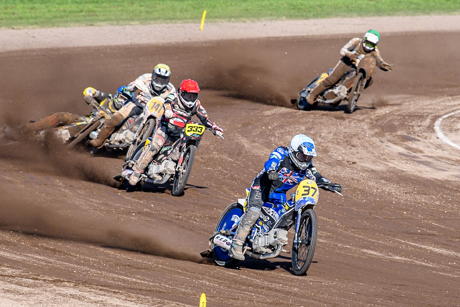 Chris Harris (37)of Great Britain in White leading Kenneth Kruse Hansen (333) of Denmark in Red and Andrew Appleton (141) of Great Britain in Yellow as Mika Meijer (54) of The Netherlands in Blue falls during the FIM Long Track World Championship Final 5 at the Speed Centre Roden, Roden, Netherlands on Sunday 22nd September 2024. (Photo: Ian Charles | MI News)