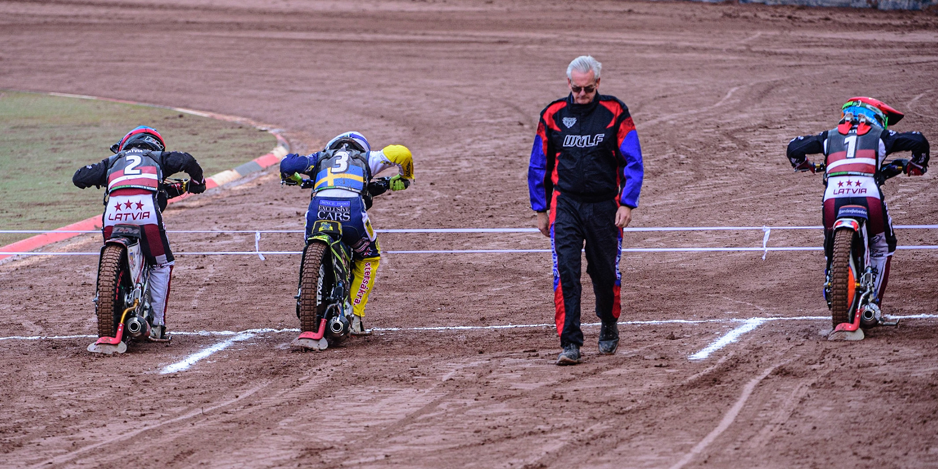 MANCHESTER, UK. OCT 17TH Start of the first race on Day 2 as Olegs Mijailovs of Latvia (Blue) Philip Hellström-Bangs of Sweden (White) and Andzejs Lebedevs of Latvia (Red) about to leave the start during the Monster Energy FIM Speedway of Nations at the National Speedway Stadium, Manchester on Sunday  17th October 2021. (Credit: Ian Charles | MI News)
