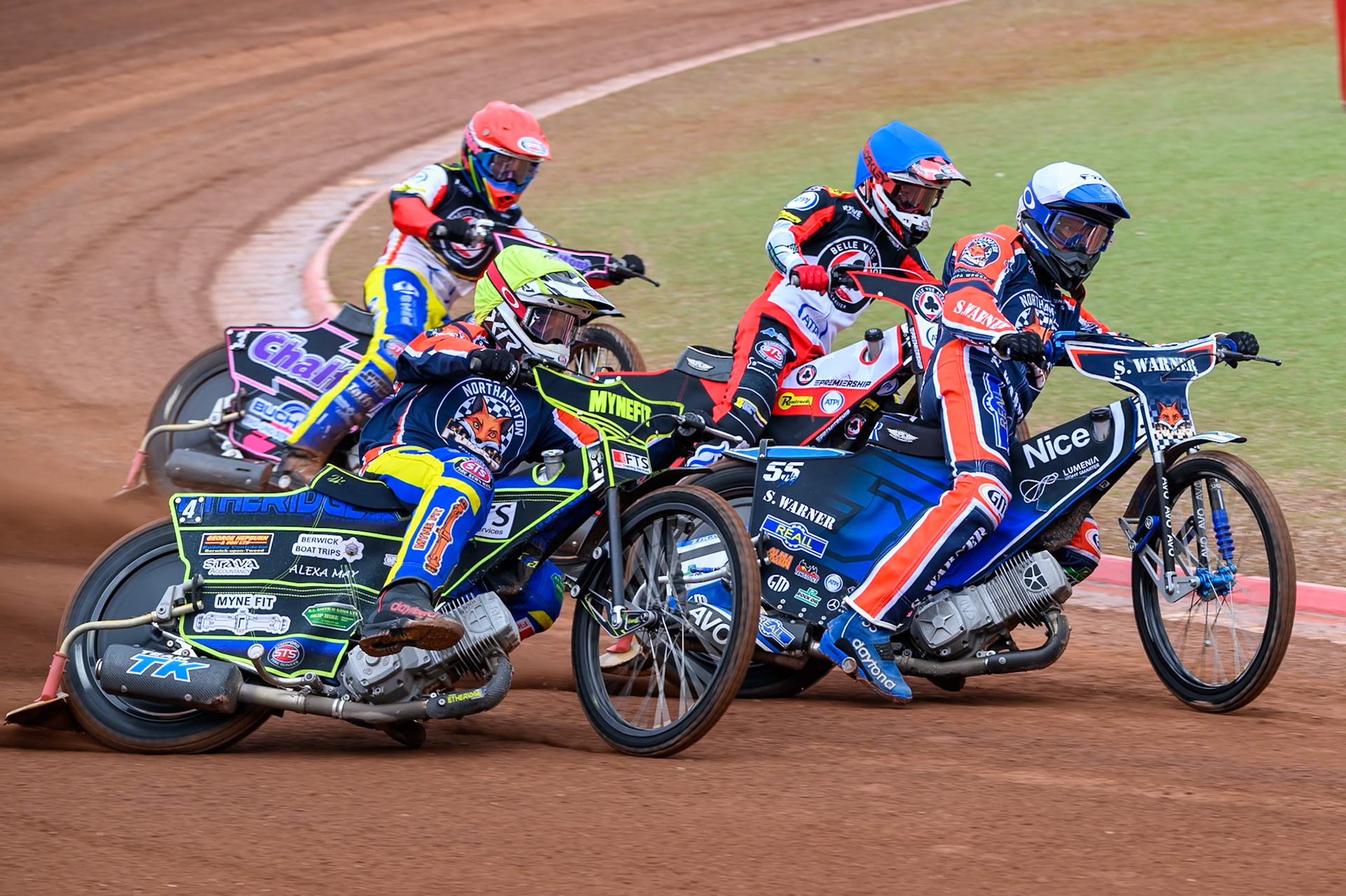 Jye Etheridge, Guest Rider for Northampton Foxes in Yellow rides outside Matej Zagar of Northampton Foxes in White and Zach Cook of Belle Vue Aces in Blue with Leon Flint, Guest Rider for Belle Vue Aces in Red behind during the Rowe Motor Oil Premiership match between Belle Vue Aces and Northampton Foxes at the National Speedway Stadium, Manchester on Monday 4th May 2026. (Photo: Ian Charles | MI News)