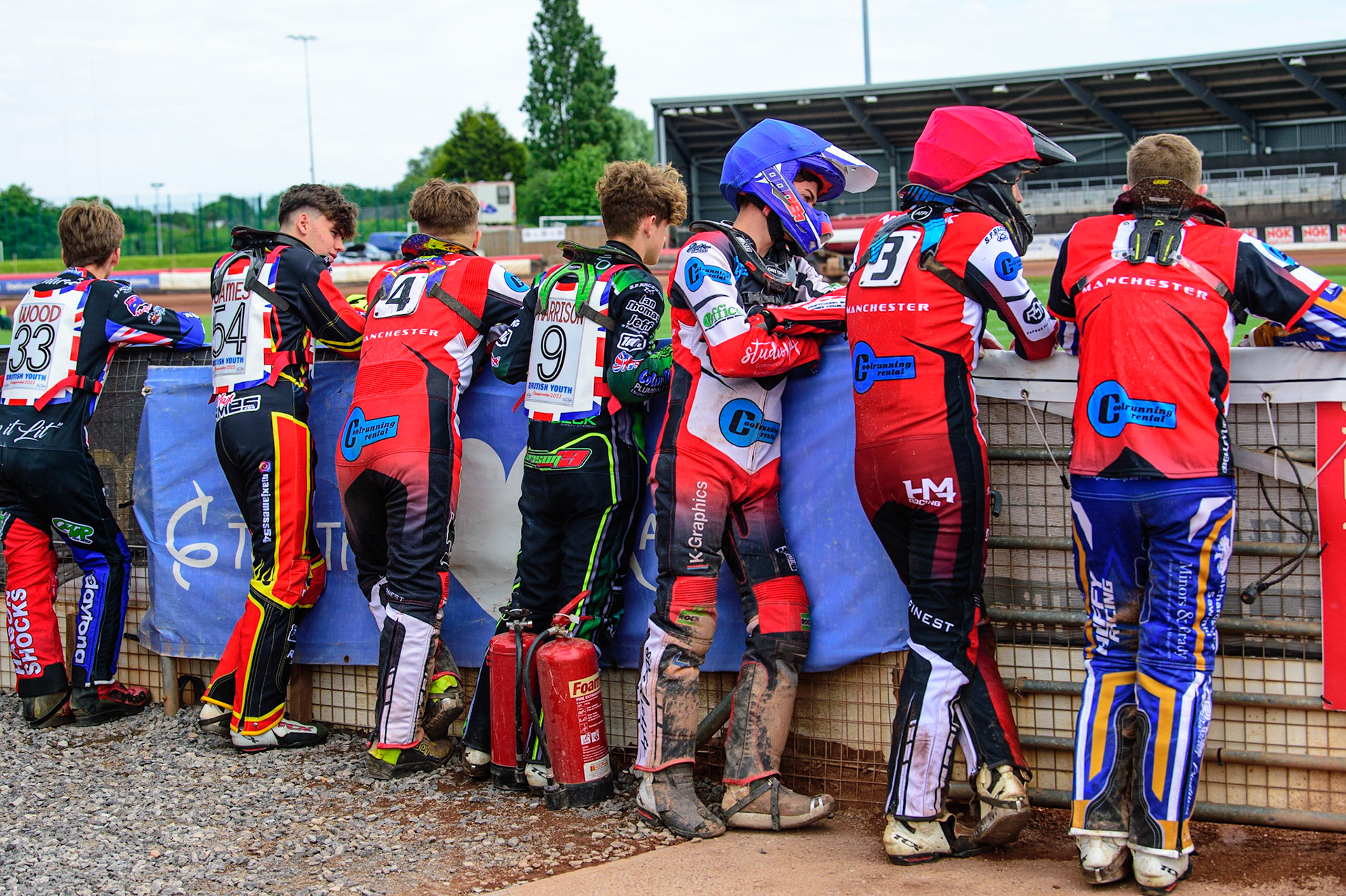MANCHESTER, UK.  JUN 3RD  Riders watch the track prep during the National Development League match between Belle Vue Colts and Oxford Chargers at the National Speedway Stadium, Manchester on Friday 3rd June 2022. (Credit: Ian Charles | MI News)