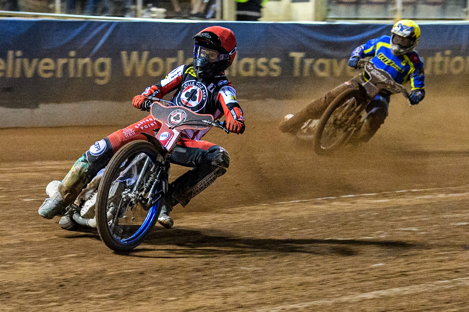 Belle Vue Aces' Brady Kurtz  in Red leading Sheffield Tigers' Guest Rider Chris Harris  in Yellow during the Rowe Motor Oil Premiership Play Off Semi Final 2, 1st Leg match between Belle Vue Aces and Sheffield Tigers at the National Speedway Stadium, Manchester on Monday 16th September 2024. (Photo: Ian Charles | MI News)