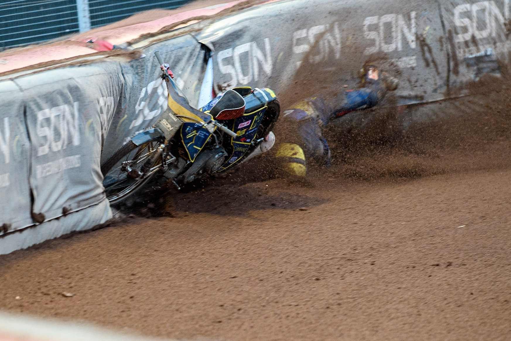 Marko Levishyn of Ukraine in Yellow crashes out of his final heat during the Monster Energy FIM Speedway of Nations Semi-Final 1 at the National Speedway Stadium, Manchester on Tuesday 9th July 2024. (Photo: Ian Charles | MI News)