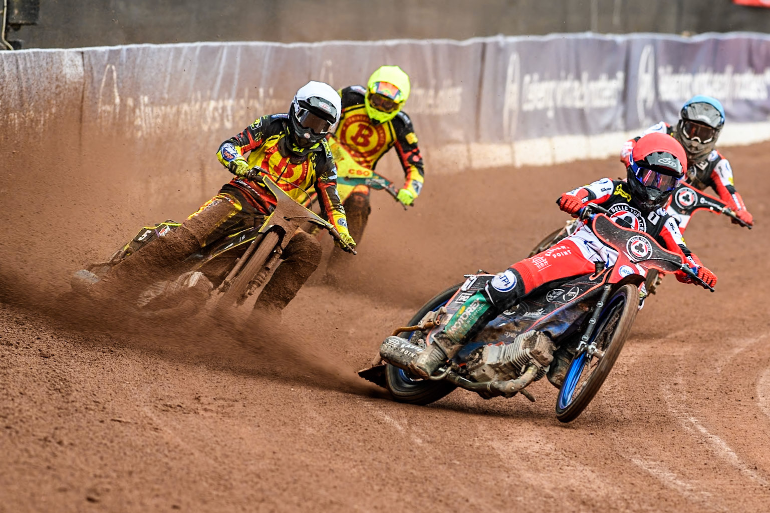 Belle Vue Aces' Brady Kurtz  in Red leading Birmingham Brummies' Tom Brennan  in White Birmingham Brummies' Vaclav Milik  in Yellow and Belle Vue Aces' Norick Blödorn  in Blue during the Rowe Motor Oil Premiership match between Belle Vue Aces and Birmingham Brummies at the National Speedway Stadium, Manchester on Monday 6th May 2024. (Photo: Ian Charles | MI News)