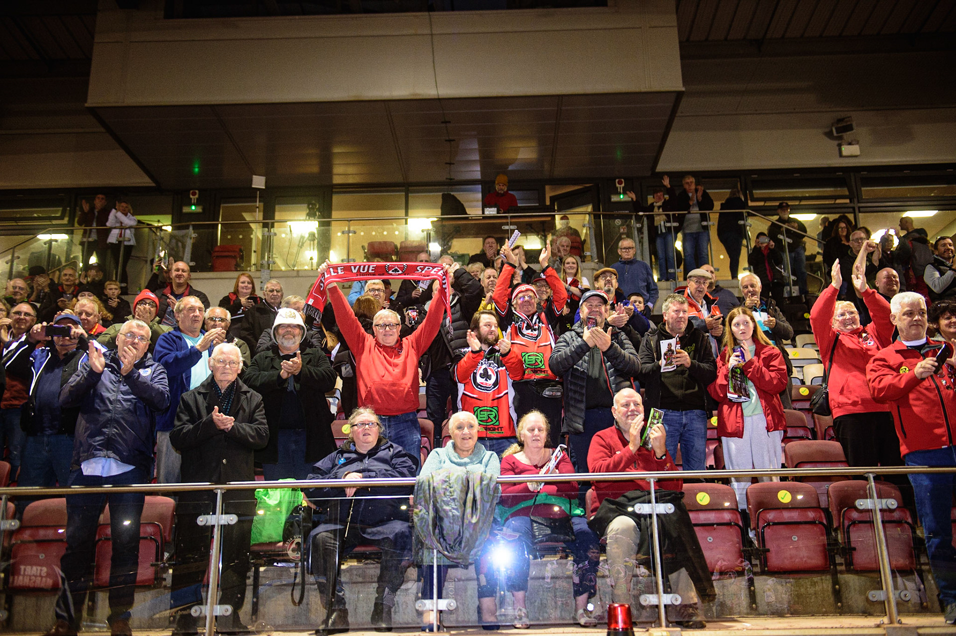 MANCHESTER, UK. OCT 7TH  Belle Vue BikeRight Aces  fans celebrate during the SGB Premiership Play off Semi-Final Second Leg between Belle Vue Aces and Sheffield Tigers at the National Speedway Stadium, Manchester on Thursday 7th October 2021. (Credit: Ian Charles | MI News)