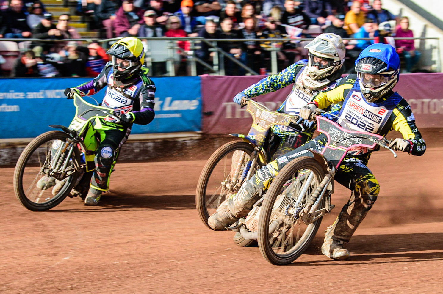 Leon Flint  (Blue) inside Paul Starke  (White) and Tom Brennan (Yellow) during the Sports Insure British Speedway Final, at the National Speedway Stadium, Manchester, on Sunday 18th September 2022. (Credit: Ian Charles | MI News )