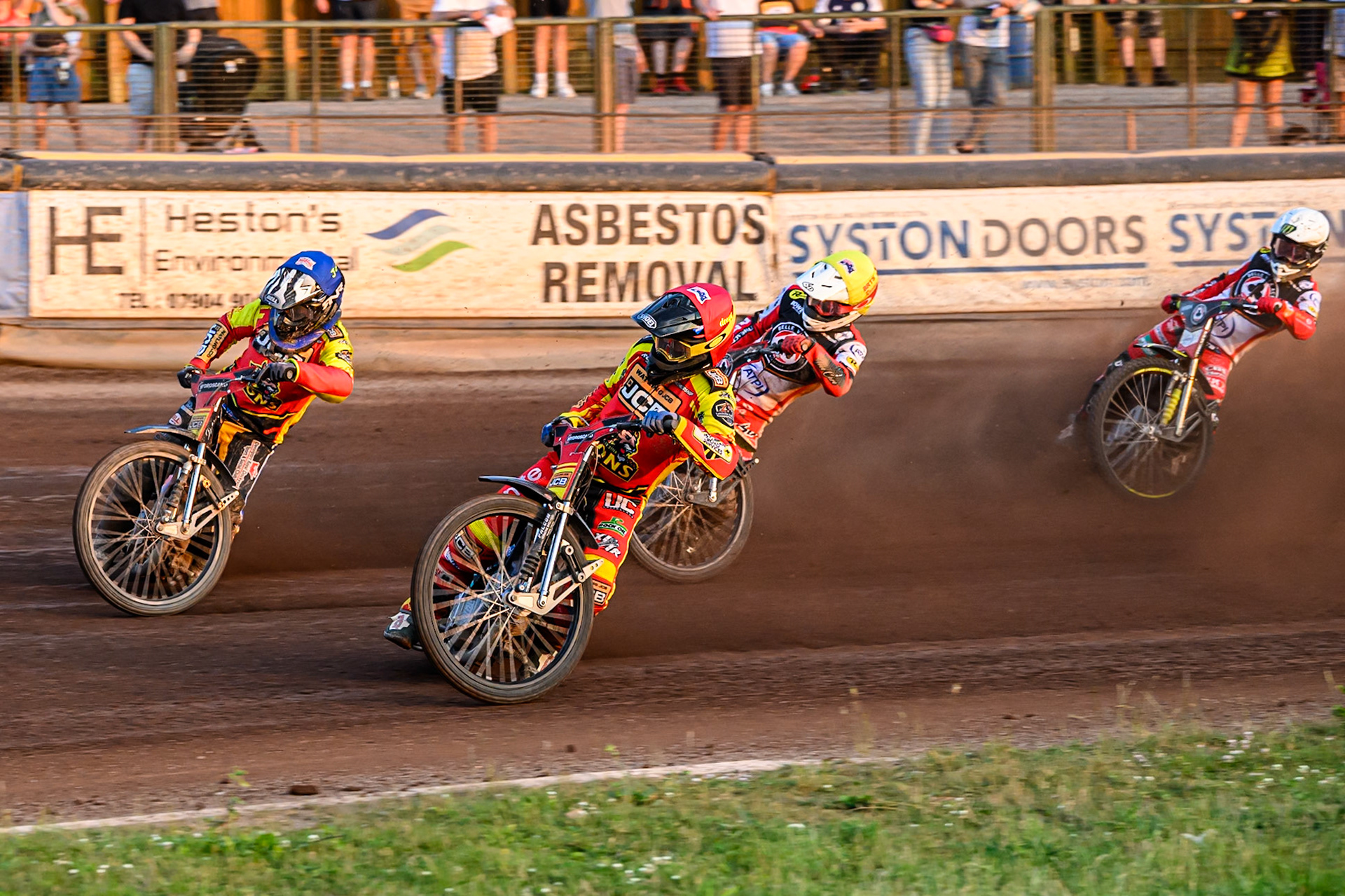 Leicester Lions' Ryan Douglas in Red and Leicester Lions' Joe Thompson in Blue leading Belle Vue Aces' Tate Zischke in Yellow and Belle Vue Aces' Jaimon Lidsey in White during the Rowe Motor Oil Premiership match between Leicester Lions and Belle Vue Aces at the Hydroscand Arena, Leicester on Thursday 19th June 2025. (Photo: Ian Charles | MI News)