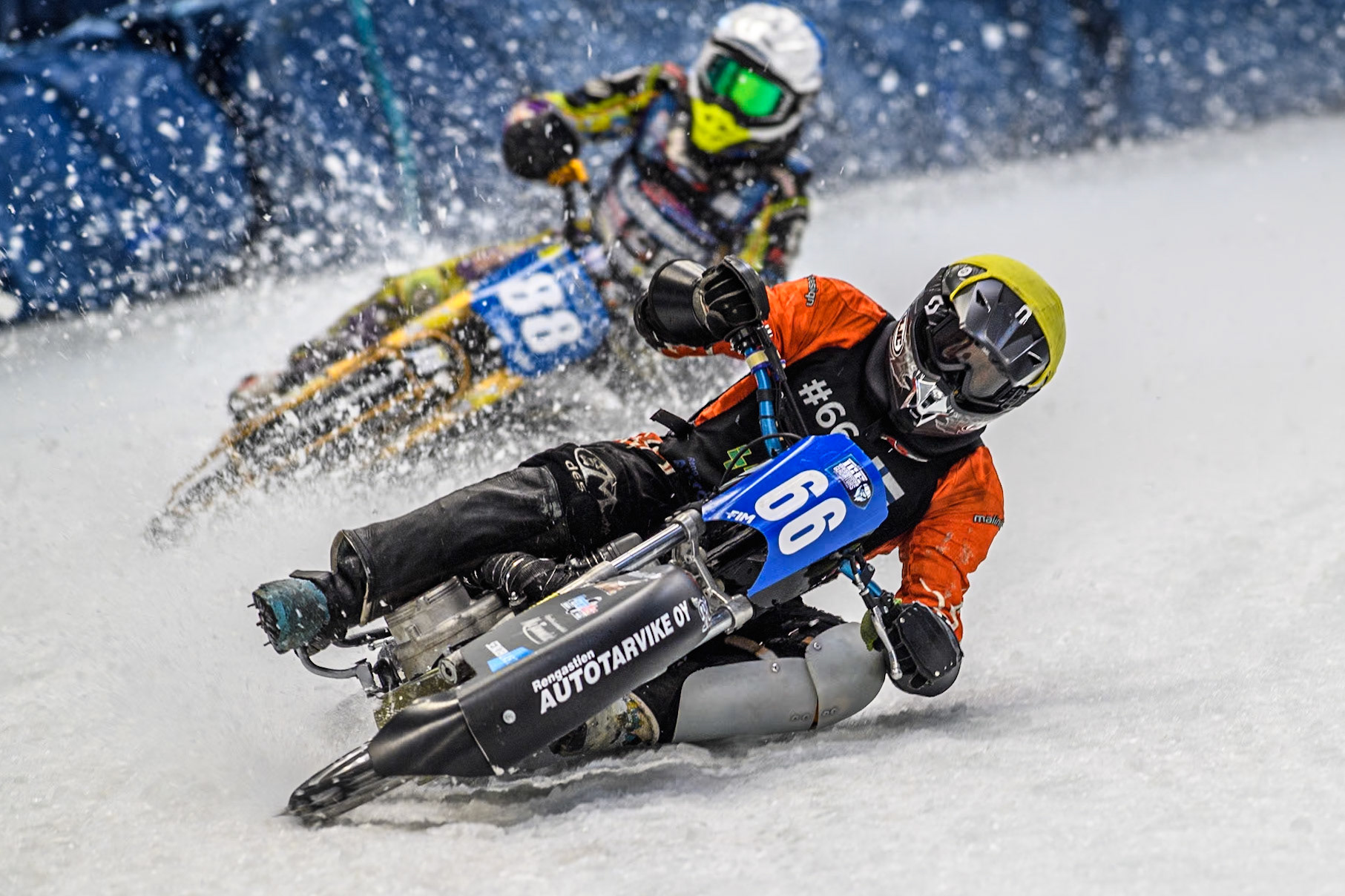 Finland's Aki Ala-Riihimäki (66) (Yellow) leads  Germany's Max Niedermaier (88) (Blue) during the FIM Ice Speedway Gladiators World Championship Final 2 at the Max-Aicher-Arena, Inzell on Sunday 24 March 2024. (Photo: Ian Charles | MI News)