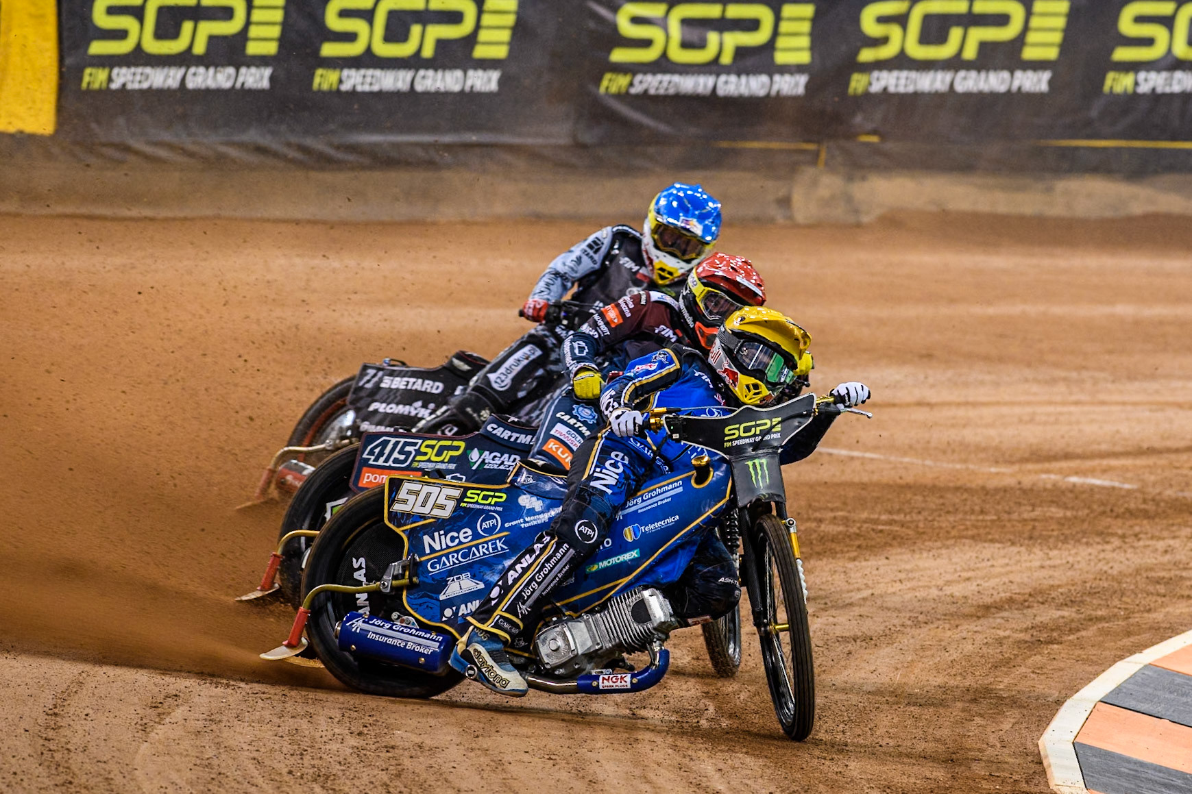 Robert Lambert (505) of Great Britain in Yellow leading Dominik Kubera (415) of Poland in Red and Maciej Janowski (71) of Poland in Blue during the FIM Speedway Grand Prix of Great Britain at The Principality Stadium, Cardiff on Saturday 17th August 2024. (Photo: Ian Charles | MI News)