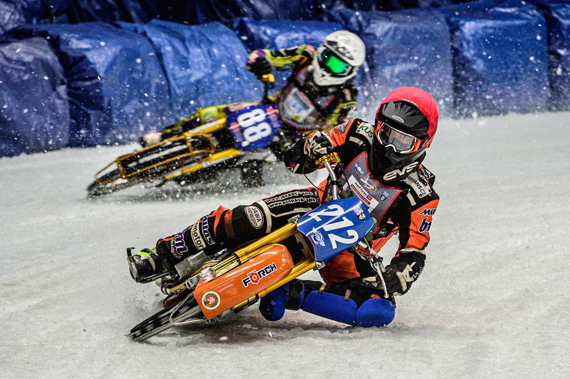 Lukas Hutla (212) (Red) leads Max Neidermaier (88)  (White) during the Ice Speedway Gladiators World Championship Final 1 at Max-Aicher-Arena, Inzell, Germany on Saturday 18th March 2023. (Photo: Ian Charles | MI News)