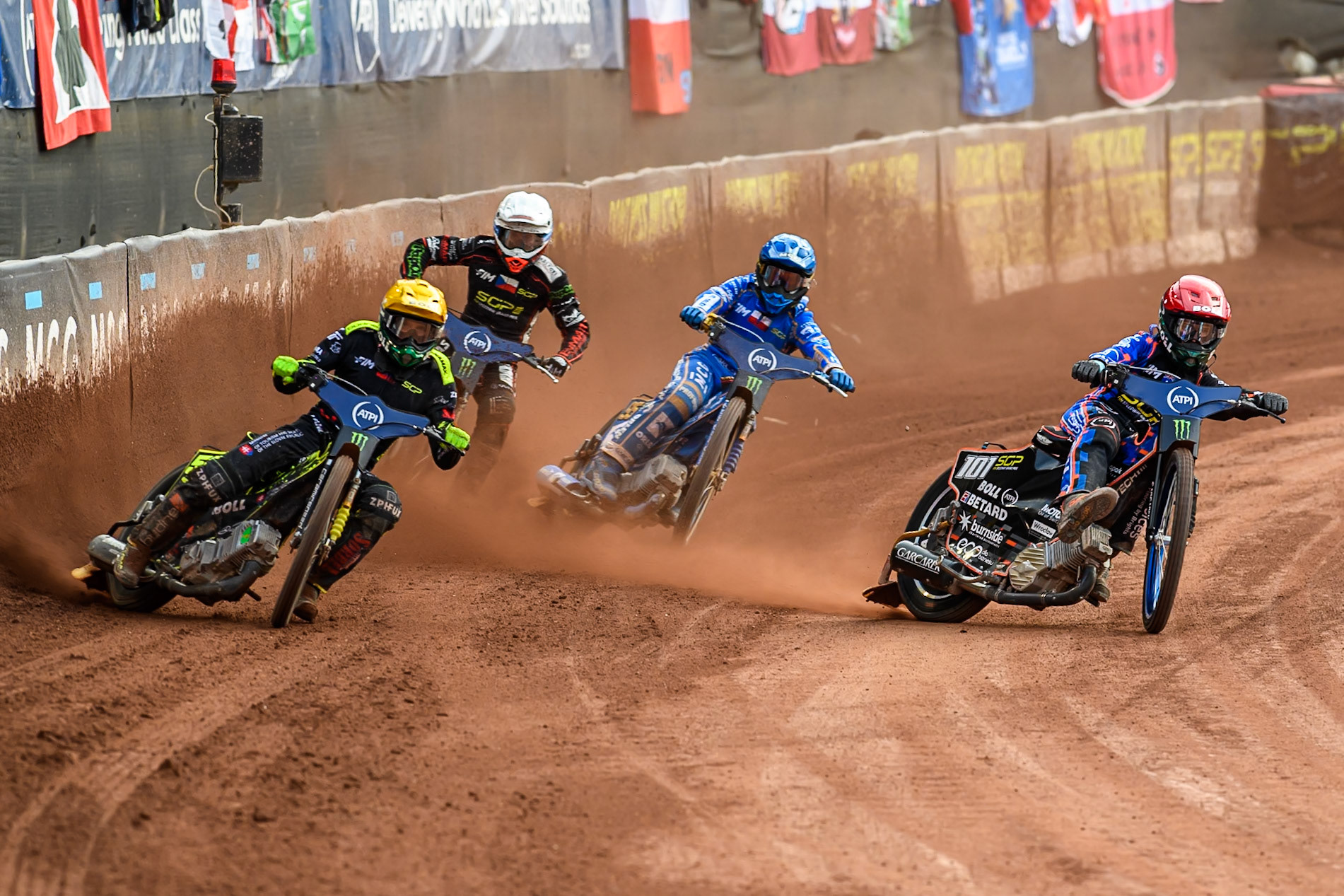 Brady Kurtz (101) of Australia in Red rides inside Martin Vaculik (54) of Slovakia in Yellow with Bartosz Zmarzlik (95) of Poland in Blue and January Kvech (201) of Czech Republic in White behind during the ATPI FIM Speedway Grand Prix Round 4 at the National Speedway Stadium, Manchester, on Friday 13th June 2025. (Photo: Ian Charles | MI News)
