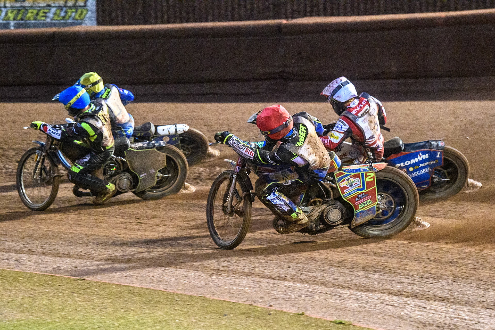 Simon Lambert (Red) chases Dan Bewley (White), Tom Brennan (Blue) and Chris Harris (Yellow) during the Sports Insure British Speedway Final at the National Speedway Stadium, Manchester on Monday 14th August 2023. (Photo: Ian Charles | MI News)
