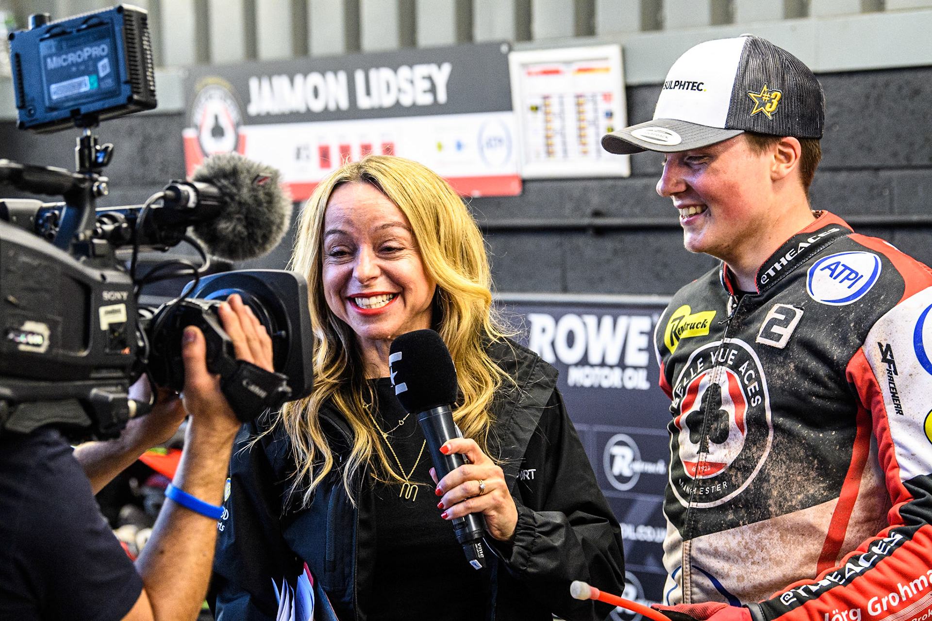 Belle Vue Aces' Norick Blodorn is interviewed by Eurosport presenter Abi Stephens during the Rowe Motor Oil Premiership match between Belle Vue Aces and Leicester Lions at the National Speedway Stadium, Manchester on Monday 24th June 2024. (Photo: Ian Charles | MI News)