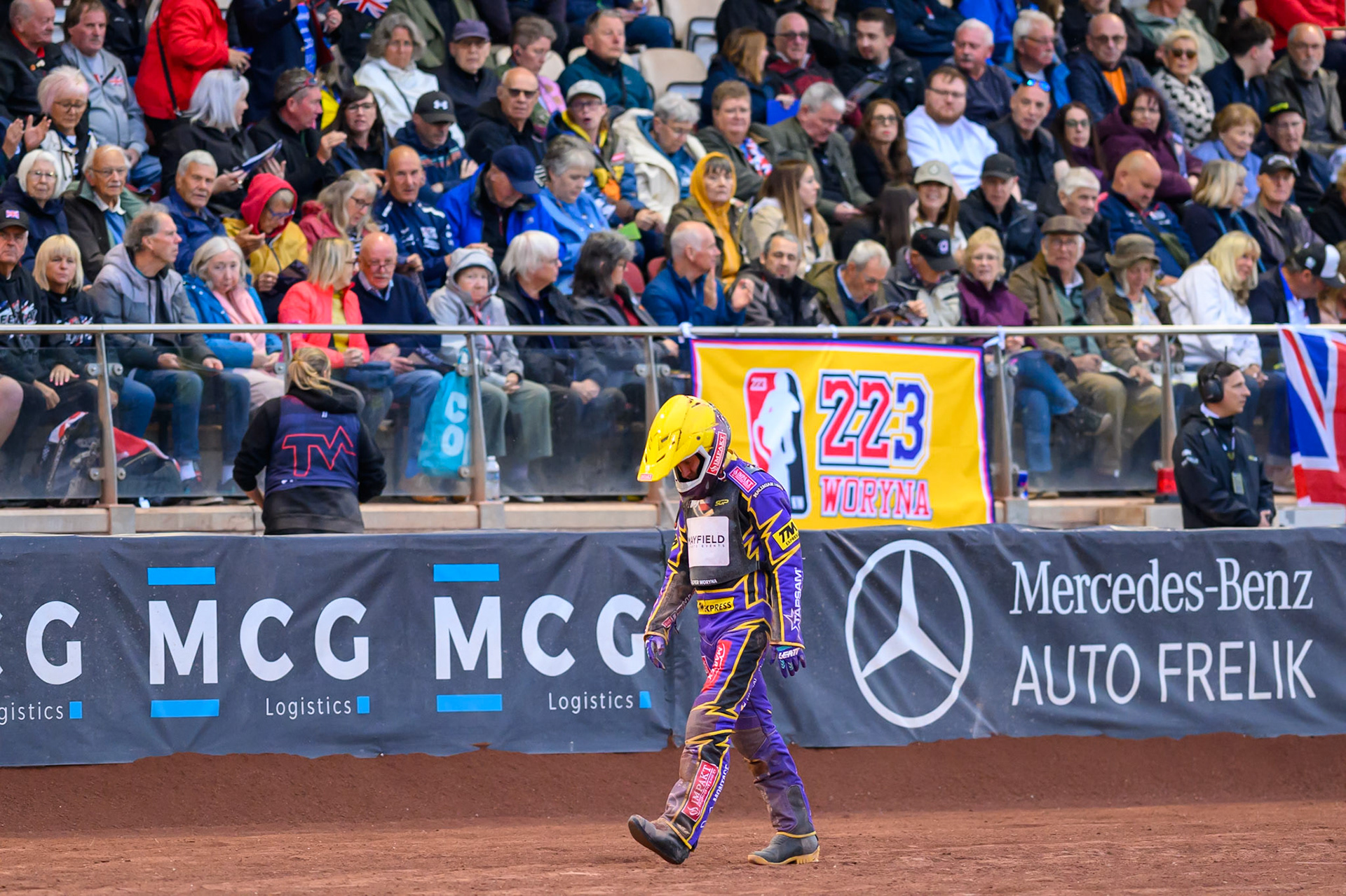 Kacper Woryna (223) of Poland walks back to the pits after his Heat 18 crash during the ATPI  FIM Speedway GP of Manchester at the National Speedway Stadium, Manchester on Friday 5th June 2026. (Photo: Ian Charles | MI News)