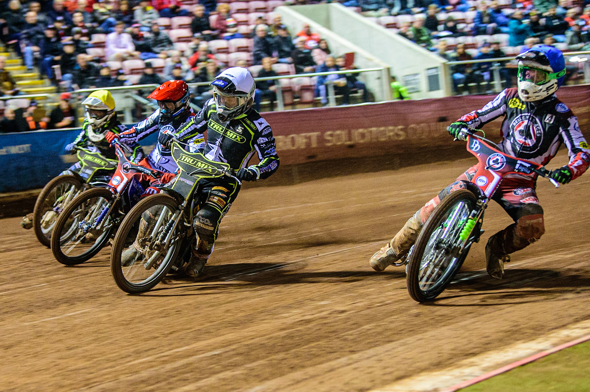 Charles Wright  (Blue) inside Troy Batchelor  (White) Matej Zagar  (Red) and Paul Starke  (Yellow) during the SGB Premiership Semi Final 2nd Leg between Belle Vue Aces and Ipswich Witches at the National Speedway Stadium, Manchester on Monday 3rd October 2022. (Credit: Ian Charles | MI News)