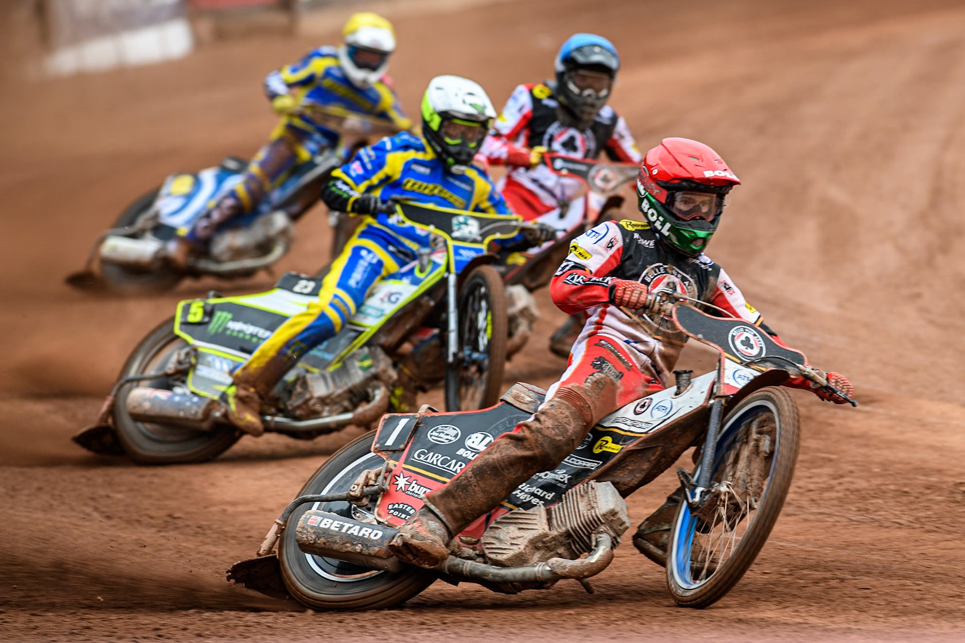 Brady Kurtz of Belle Vue Aces in Red leading Chris Holder of Sheffield Tigers in White, Norick Blödorn of Belle Vue Aces in Blue’ and Lewis Kerr of Sheffield Tigers in Yellow during the Rowe Motor Oil Premiership match between Belle Vue Aces and Sheffield Tigers at the National Speedway Stadium, Manchester on Monday 5th May 2025. (Photo: Ian Charles | MI News)
