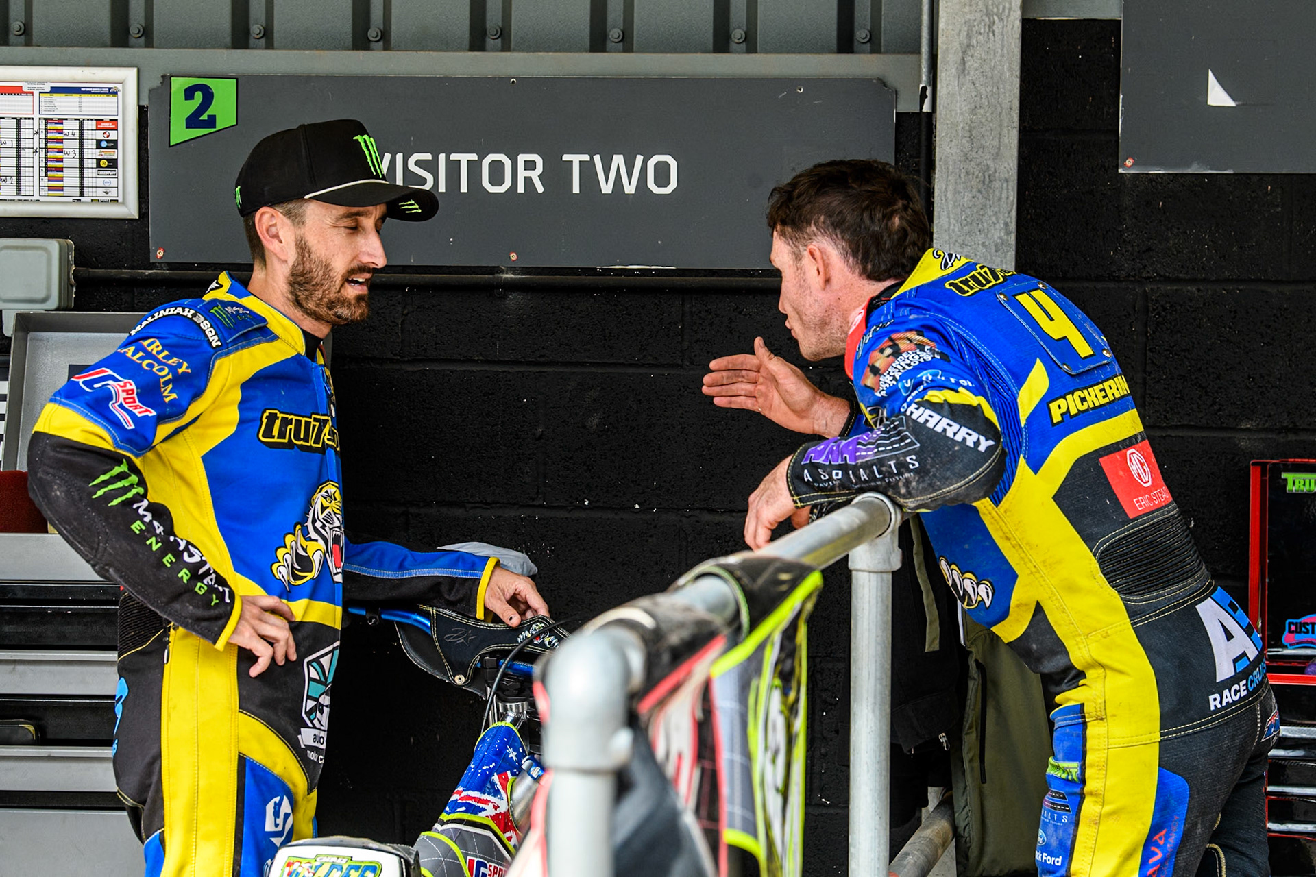 Sheffield Tigers' Josh Pickering  (Right) chats with Sheffield Tigers' Chris Holder  during the Rowe Motor Oil Premiership match between Belle Vue Aces and Sheffield Tigers at the National Speedway Stadium, Manchester on Monday 26th August 2024. (Photo: Ian Charles | MI News)
