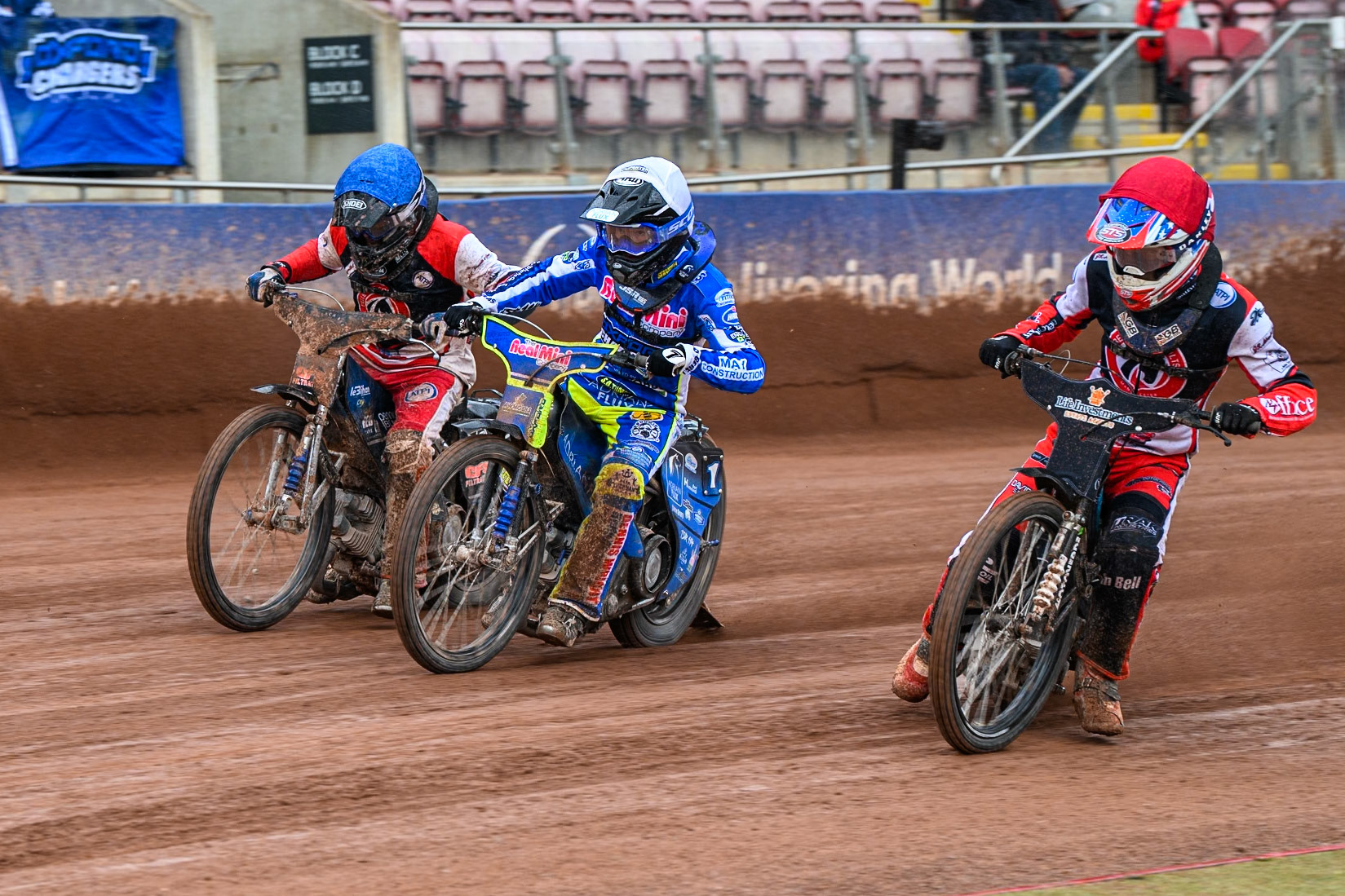 Belle Vue Colts' Freddy Hodder  in Red rides inside Oxford Chargers' Jody Scott  in White and Belle Vue Colts' Jack Kingston  in Blue during the WSRA National Development League match between Belle Vue Colts and Oxford Chargers at the National Speedway Stadium, Manchester on Sunday 1st June 2025. (Photo: Ian Charles | MI News)