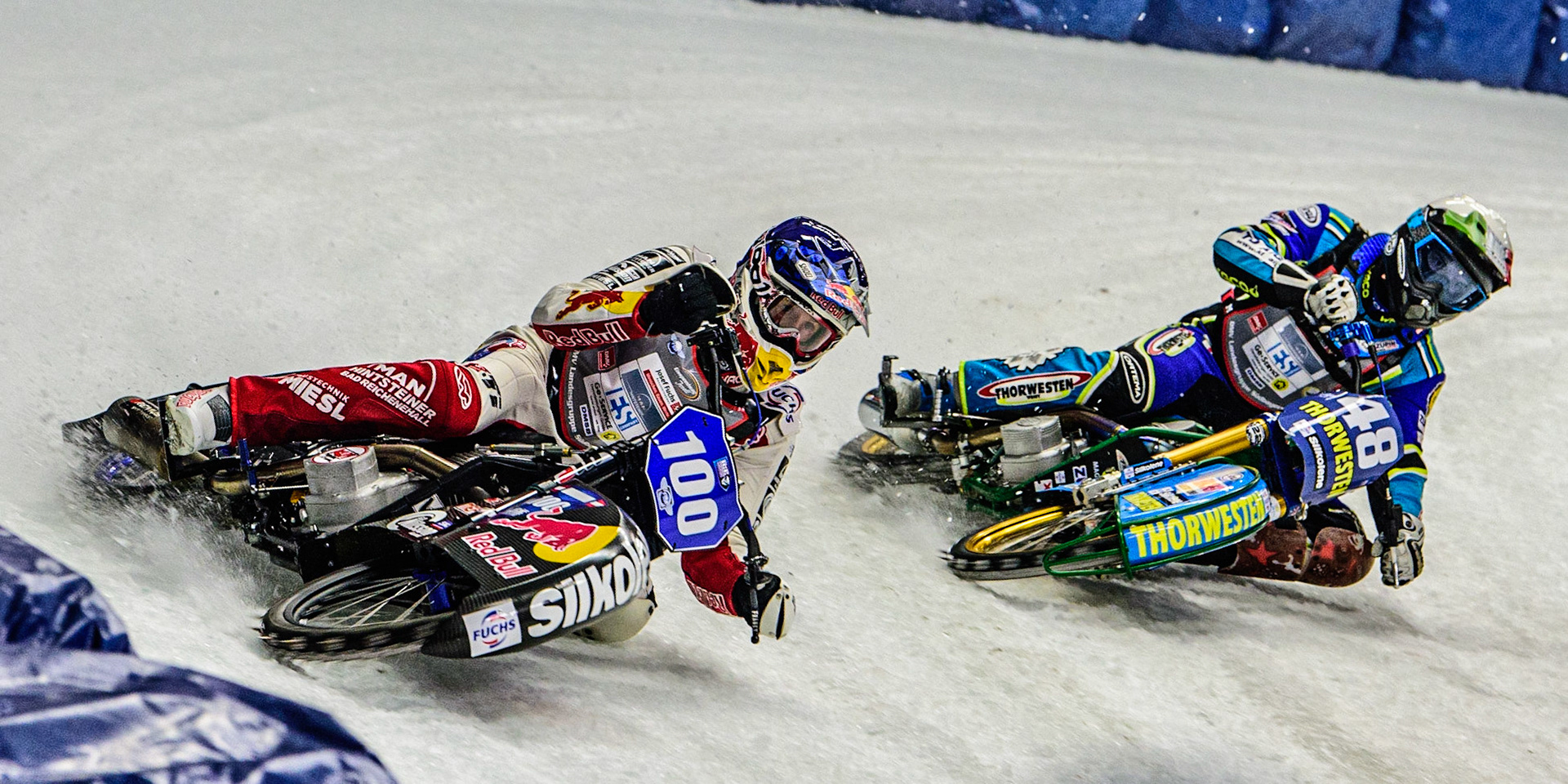 Franz Zorn (100) (Blue) outside Luca Bauer (48) (White) during the Ice Speedway Gladiators World Championship Final 1 at Max-Aicher-Arena, Inzell, Germany on Saturday 18th March 2023. (Photo: Ian Charles | MI News)