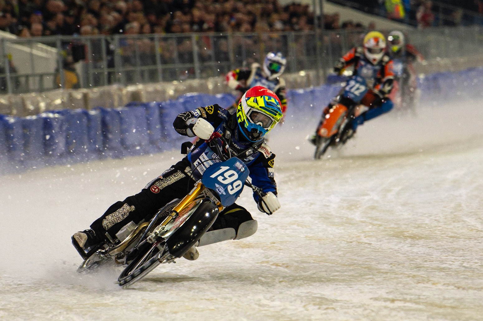 HEERENVEEN, NL. Martin Hååruhiltunen (199)  with a good lead over the other riders in Heat 13 during the FIM Ice Speedway Gladiators World Championship Final 3 at Ice Rink Thialf, Heerenveen on Saturday  2 April 2022. (Credit: Ian Charles | MI News)