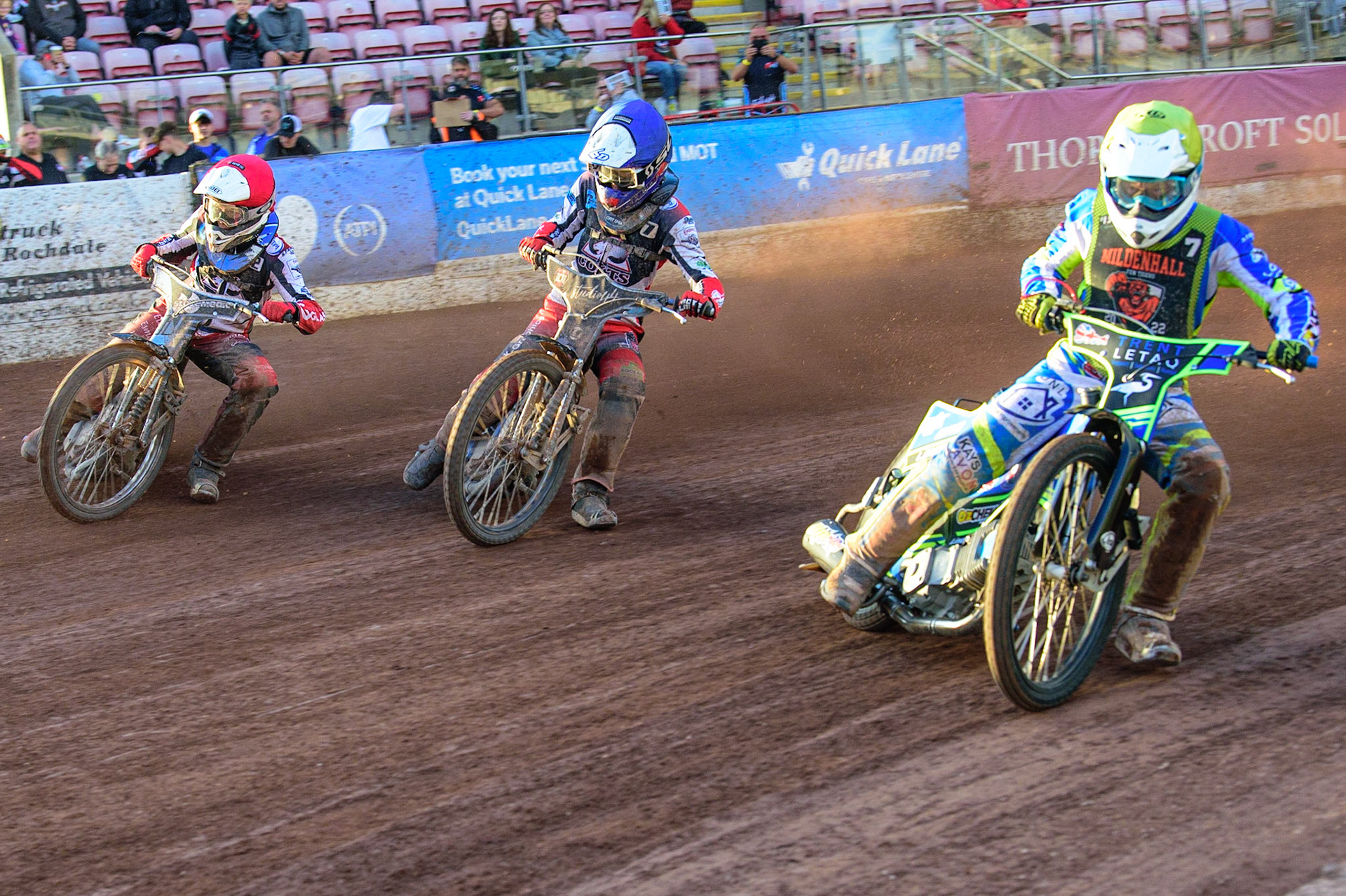 Luke Muff  (Yellow) inside Freddy Hodder  (Blue) and Sam McGurk  (Red) during the National Development League match between Belle Vue Colts and Mildenhall Fens Tigers at the National Speedway Stadium, Manchester on Friday 15th July 2022. (Credit: Ian Charles | MI News)